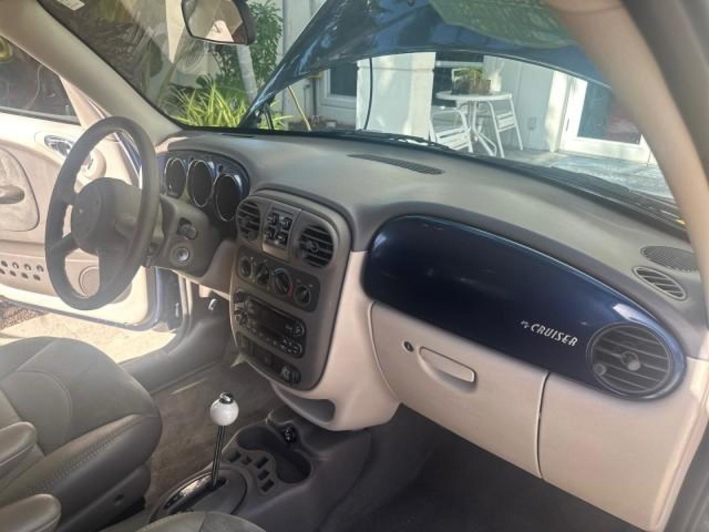 2003 Electric Blue Pearl /Taupe/Pearl Beige Chrysler PT Cruiser Limited WOODY LOW MILES 41,863 (3C8FY68B13T) with an 2.4L DOHC SMPI 16-Valve I4 Engine engine, Automatic transmission, located at 4701 North Dixie Hwy, Pompano Beach, FL, 33064, (954) 422-2889, 26.240938, -80.123474 - OUR WEBPAGE FLORIDACARS1.COM HAS OVER 100 PHOTOS AND FREE CARFAX LINK 2003 CHRYSLER PT CRUISER LIMITED EDITION WOODY EDITION VIN: 3C8FY68B13T591246 3 C 8 F Y 6 8 B 1 3 T 5 9 1 2 4 6 2.4L I4 F DOHC 16V GASOLINE 29 MPG FRONT WHEEL DRIVE NO RECALLS Top Features Alloy Wheels Leather and Suede Seats Su - Photo#84