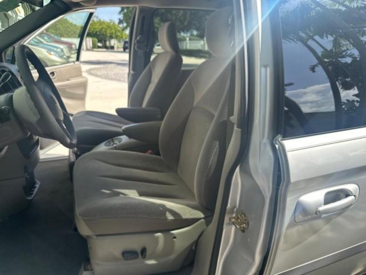 2003 Bright Silver Metallic /Taupe Dodge Caravan EX 1 OWNER FL LOW MILES 58,965 (2D4GP74L93R) with an 3.8L SMPI V6 Engine engine, Automatic transmission, located at 4701 North Dixie Hwy, Pompano Beach, FL, 33064, (954) 422-2889, 26.240938, -80.123474 - OUR WEBPAGE FLORIDACARS1.COM HAS OVER 100 PHOTOS AND FREE CARFAX LINK 2003 DODGE GRAND CARAVAN EX NO RECALLS VIN: 2D4GP74L93R244217 2 D 4 G P 7 4 L 9 3 R 2 4 4 2 1 7 VAN 3.8L V6 F OHV 12V GASOLINE FRONT WHEEL DRIVE NO RECALLS Top Features Alloy Wheels Quad Seats Cloth Seats Rear Air Conditioning Pow - Photo#64