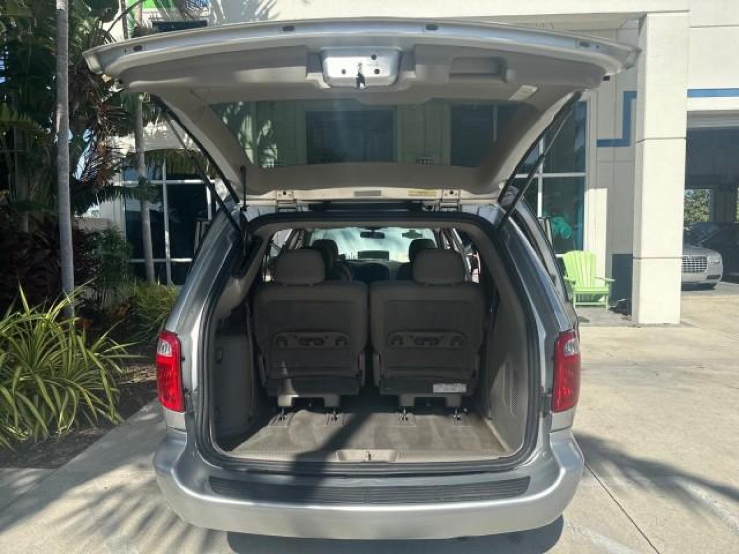 2003 Bright Silver Metallic /Taupe Dodge Caravan EX 1 OWNER FL LOW MILES 58,965 (2D4GP74L93R) with an 3.8L SMPI V6 Engine engine, Automatic transmission, located at 4701 North Dixie Hwy, Pompano Beach, FL, 33064, (954) 422-2889, 26.240938, -80.123474 - OUR WEBPAGE FLORIDACARS1.COM HAS OVER 100 PHOTOS AND FREE CARFAX LINK 2003 DODGE GRAND CARAVAN EX NO RECALLS VIN: 2D4GP74L93R244217 2 D 4 G P 7 4 L 9 3 R 2 4 4 2 1 7 VAN 3.8L V6 F OHV 12V GASOLINE FRONT WHEEL DRIVE NO RECALLS Top Features Alloy Wheels Quad Seats Cloth Seats Rear Air Conditioning Pow - Photo#8