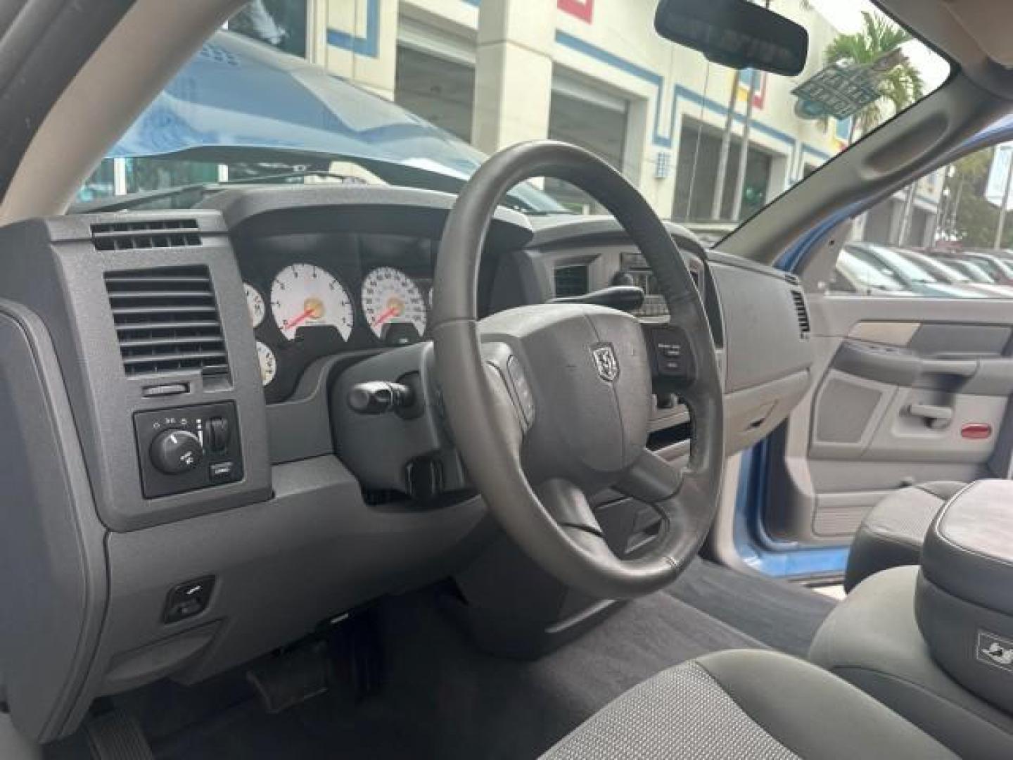 2006 Atlantic Blue Pearl /Medium Slate Gray Dodge Ram 1500 SLT 1 OWNER 5077 MILES MINT 5.7 V8 HEMI (1D7HA16226J) with an 5.7L V8 Hemi Multi-Displacement Engine engine, Automatic transmission, located at 4701 North Dixie Hwy, Pompano Beach, FL, 33064, (954) 422-2889, 26.240938, -80.123474 - OUR WEBPAGE FLORIDACARS1.COM HAS OVER 100 PHOTOS AND FREE CARFAX LINK 2006 DODGE RAM 1500 SLT SPORT VIN: 1D7HA16226J149341 1 D 7 H A 1 6 2 2 6 J 1 4 9 3 4 1 PICKUP 5.7L V8 F 16V HEMI GASOLINE REAR WHEEL DRIVE NO RECALLS THIS IS ONE OF THE NICEST DODGE RAMS WE HAVE EVER LISTED RETIREE 1 OWNER FLORIDA - Photo#16