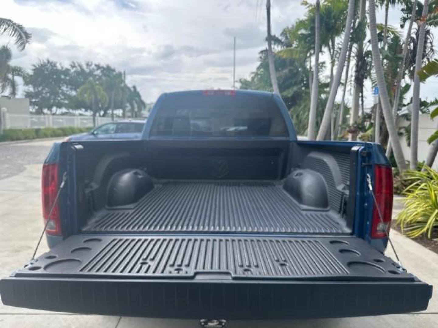 2006 Atlantic Blue Pearl /Medium Slate Gray Dodge Ram 1500 SLT 1 OWNER 5077 MILES MINT 5.7 V8 HEMI (1D7HA16226J) with an 5.7L V8 Hemi Multi-Displacement Engine engine, Automatic transmission, located at 4701 North Dixie Hwy, Pompano Beach, FL, 33064, (954) 422-2889, 26.240938, -80.123474 - OUR WEBPAGE FLORIDACARS1.COM HAS OVER 100 PHOTOS AND FREE CARFAX LINK 2006 DODGE RAM 1500 SLT SPORT VIN: 1D7HA16226J149341 1 D 7 H A 1 6 2 2 6 J 1 4 9 3 4 1 PICKUP 5.7L V8 F 16V HEMI GASOLINE REAR WHEEL DRIVE NO RECALLS THIS IS ONE OF THE NICEST DODGE RAMS WE HAVE EVER LISTED RETIREE 1 OWNER FLORIDA - Photo#44