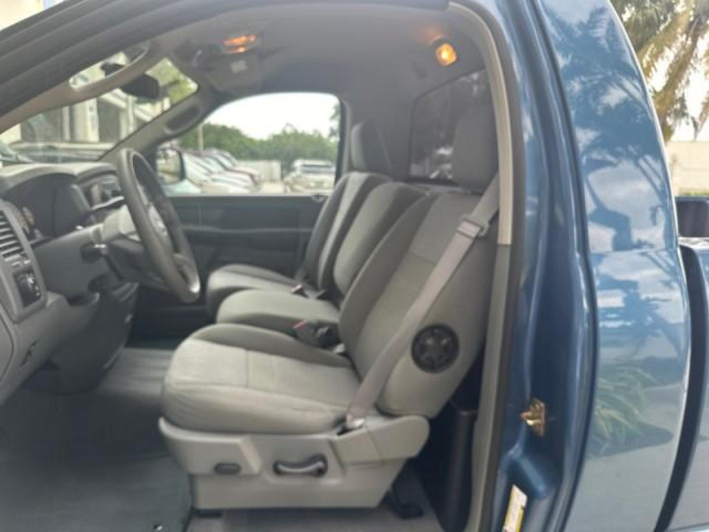 2006 Atlantic Blue Pearl /Medium Slate Gray Dodge Ram 1500 SLT 1 OWNER 5077 MILES MINT 5.7 V8 HEMI (1D7HA16226J) with an 5.7L V8 Hemi Multi-Displacement Engine engine, Automatic transmission, located at 4701 North Dixie Hwy, Pompano Beach, FL, 33064, (954) 422-2889, 26.240938, -80.123474 - OUR WEBPAGE FLORIDACARS1.COM HAS OVER 100 PHOTOS AND FREE CARFAX LINK 2006 DODGE RAM 1500 SLT SPORT VIN: 1D7HA16226J149341 1 D 7 H A 1 6 2 2 6 J 1 4 9 3 4 1 PICKUP 5.7L V8 F 16V HEMI GASOLINE REAR WHEEL DRIVE NO RECALLS THIS IS ONE OF THE NICEST DODGE RAMS WE HAVE EVER LISTED RETIREE 1 OWNER FLORIDA - Photo#72