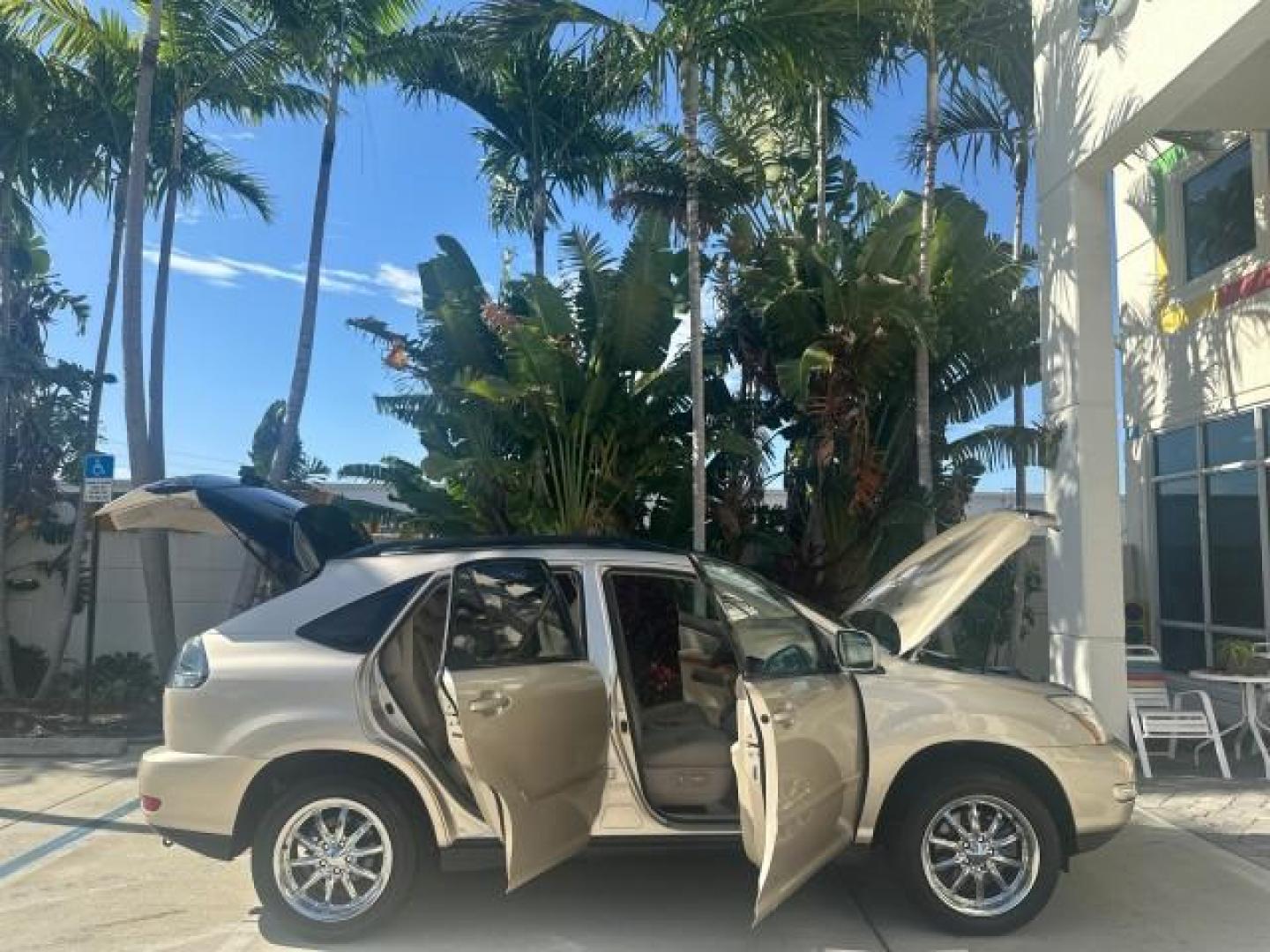 2004 Bamboo Pearl /Ivory Lexus RX 330 SUV LOW MILES 60,687 NAV (2T2GA31U54C) with an 3.3L DOHC MPI 24-Valve V6 Engine engine, Automatic transmission, located at 4701 North Dixie Hwy, Pompano Beach, FL, 33064, (954) 422-2889, 26.240938, -80.123474 - OUR WEBPAGE FLORIDACARS1.COM HAS OVER 100 PHOTOS AND FREE CARFAX LINK 2004 LEXUS RX 330 NAVIGATION ROAD READY 3.3L V6 VIN: 2T2GA31U54C002347 NO ACCIDENTS NO RECALLS 2 T 2 G A 3 1 U 5 4 C 0 0 2 3 4 7 FLORIDA OWNER 26 MPG 4 DOOR WAGON/SPORT UTILITY SUNROOF NAVIGATION 3.3L V6 F 24V DUAL AC POWER LEATHE - Photo#7