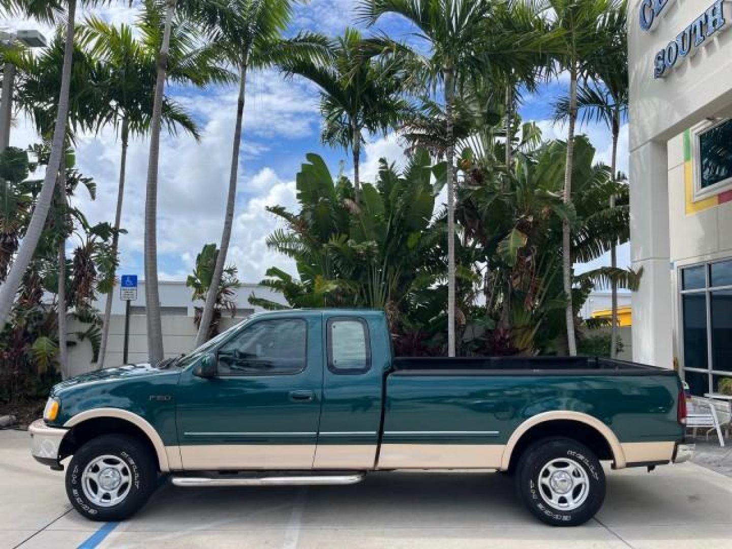 1997 Pacific Green (CC/Met) /Medium Prarie Tan Ford F-150 4WD Lariat LOW MILES 89,299 (1FTDX1860VK) with an 4.6L EFI OHC V8 Triton Engine engine, Automatic transmission, located at 4701 North Dixie Hwy, Pompano Beach, FL, 33064, (954) 422-2889, 26.240938, -80.123474 - OUR WEBPAGE FLORIDACARS1.COM HAS OVER 100 PHOTOS AND FREE CARFAX LINK 1997 FORD F-150 ROAD READY WORK READY VIN: 1FTDX1860VKA73358 NO ACCIDENTS 4X4 3 DOOR EXTENDED CAB PICKUP NO RECALLS 4.6L V8 4.6L V8 F 4X4 FLORIDA OWNER GASOLINE 20 SERVICE RECORDS POWER LEATHER SEATS REAR WHEEL DRIVE W/ 4X4 8 FT B - Photo#4