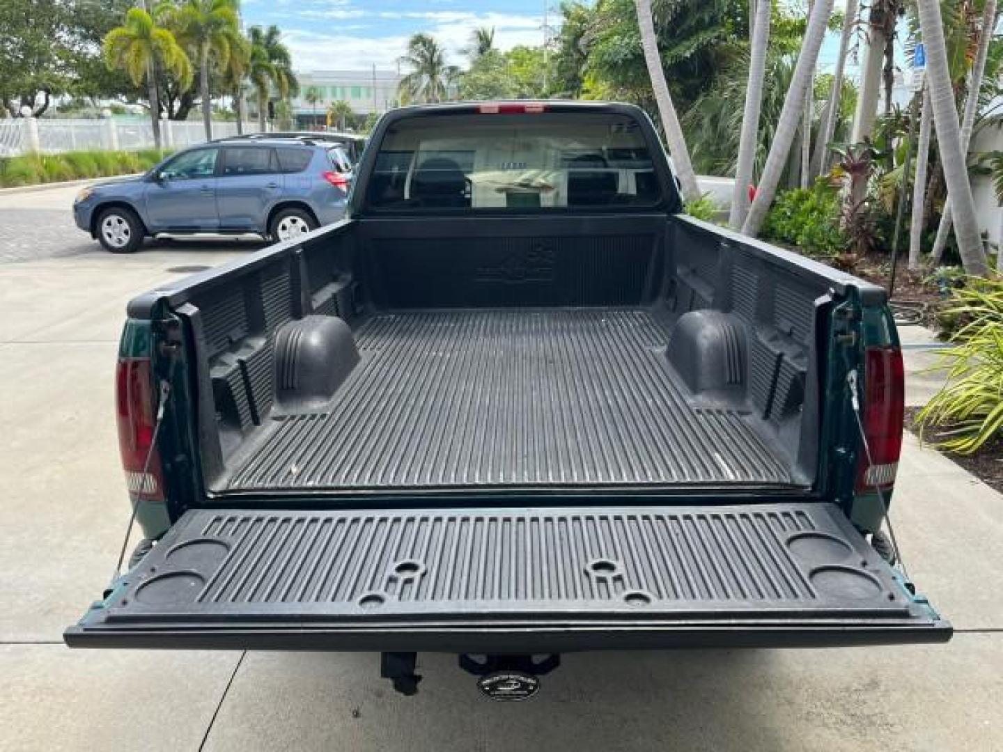 1997 Pacific Green (CC/Met) /Medium Prarie Tan Ford F-150 4WD Lariat LOW MILES 89,299 (1FTDX1860VK) with an 4.6L EFI OHC V8 Triton Engine engine, Automatic transmission, located at 4701 North Dixie Hwy, Pompano Beach, FL, 33064, (954) 422-2889, 26.240938, -80.123474 - OUR WEBPAGE FLORIDACARS1.COM HAS OVER 100 PHOTOS AND FREE CARFAX LINK 1997 FORD F-150 ROAD READY WORK READY VIN: 1FTDX1860VKA73358 NO ACCIDENTS 4X4 3 DOOR EXTENDED CAB PICKUP NO RECALLS 4.6L V8 4.6L V8 F 4X4 FLORIDA OWNER GASOLINE 20 SERVICE RECORDS POWER LEATHER SEATS REAR WHEEL DRIVE W/ 4X4 8 FT B - Photo#62