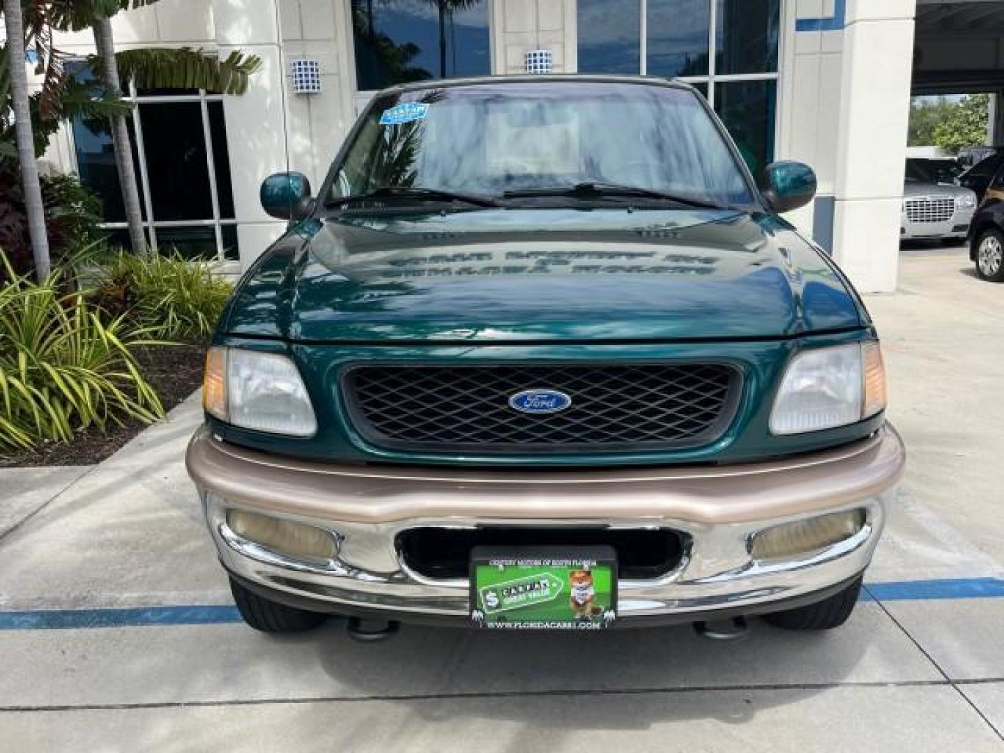 1997 Pacific Green (CC/Met) /Medium Prarie Tan Ford F-150 4WD Lariat LOW MILES 89,299 (1FTDX1860VK) with an 4.6L EFI OHC V8 Triton Engine engine, Automatic transmission, located at 4701 North Dixie Hwy, Pompano Beach, FL, 33064, (954) 422-2889, 26.240938, -80.123474 - OUR WEBPAGE FLORIDACARS1.COM HAS OVER 100 PHOTOS AND FREE CARFAX LINK 1997 FORD F-150 ROAD READY WORK READY VIN: 1FTDX1860VKA73358 NO ACCIDENTS 4X4 3 DOOR EXTENDED CAB PICKUP NO RECALLS 4.6L V8 4.6L V8 F 4X4 FLORIDA OWNER GASOLINE 20 SERVICE RECORDS POWER LEATHER SEATS REAR WHEEL DRIVE W/ 4X4 8 FT B - Photo#68