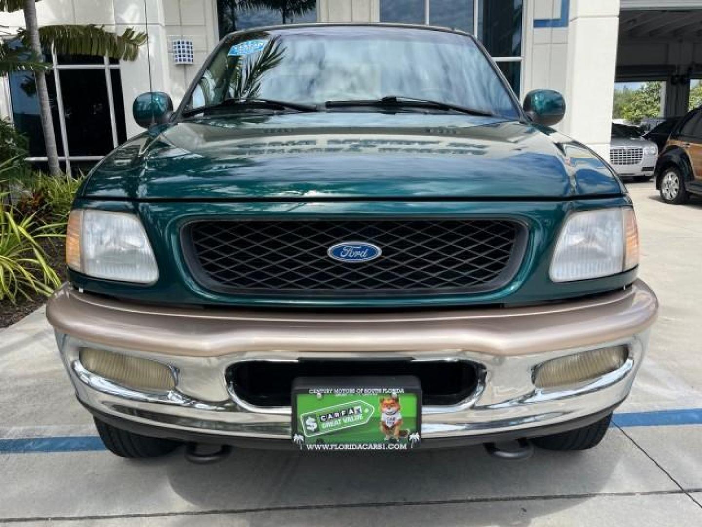 1997 Pacific Green (CC/Met) /Medium Prarie Tan Ford F-150 4WD Lariat LOW MILES 89,299 (1FTDX1860VK) with an 4.6L EFI OHC V8 Triton Engine engine, Automatic transmission, located at 4701 North Dixie Hwy, Pompano Beach, FL, 33064, (954) 422-2889, 26.240938, -80.123474 - OUR WEBPAGE FLORIDACARS1.COM HAS OVER 100 PHOTOS AND FREE CARFAX LINK 1997 FORD F-150 ROAD READY WORK READY VIN: 1FTDX1860VKA73358 NO ACCIDENTS 4X4 3 DOOR EXTENDED CAB PICKUP NO RECALLS 4.6L V8 4.6L V8 F 4X4 FLORIDA OWNER GASOLINE 20 SERVICE RECORDS POWER LEATHER SEATS REAR WHEEL DRIVE W/ 4X4 8 FT B - Photo#75