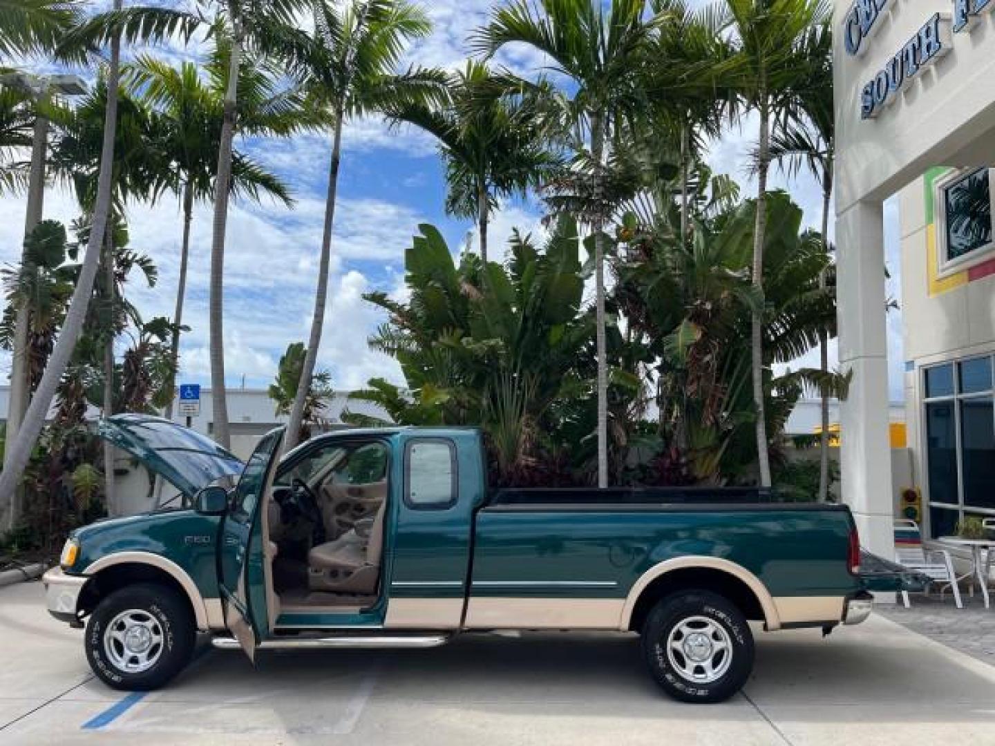 1997 Pacific Green (CC/Met) /Medium Prarie Tan Ford F-150 4WD Lariat LOW MILES 89,299 (1FTDX1860VK) with an 4.6L EFI OHC V8 Triton Engine engine, Automatic transmission, located at 4701 North Dixie Hwy, Pompano Beach, FL, 33064, (954) 422-2889, 26.240938, -80.123474 - OUR WEBPAGE FLORIDACARS1.COM HAS OVER 100 PHOTOS AND FREE CARFAX LINK 1997 FORD F-150 ROAD READY WORK READY VIN: 1FTDX1860VKA73358 NO ACCIDENTS 4X4 3 DOOR EXTENDED CAB PICKUP NO RECALLS 4.6L V8 4.6L V8 F 4X4 FLORIDA OWNER GASOLINE 20 SERVICE RECORDS POWER LEATHER SEATS REAR WHEEL DRIVE W/ 4X4 8 FT B - Photo#8