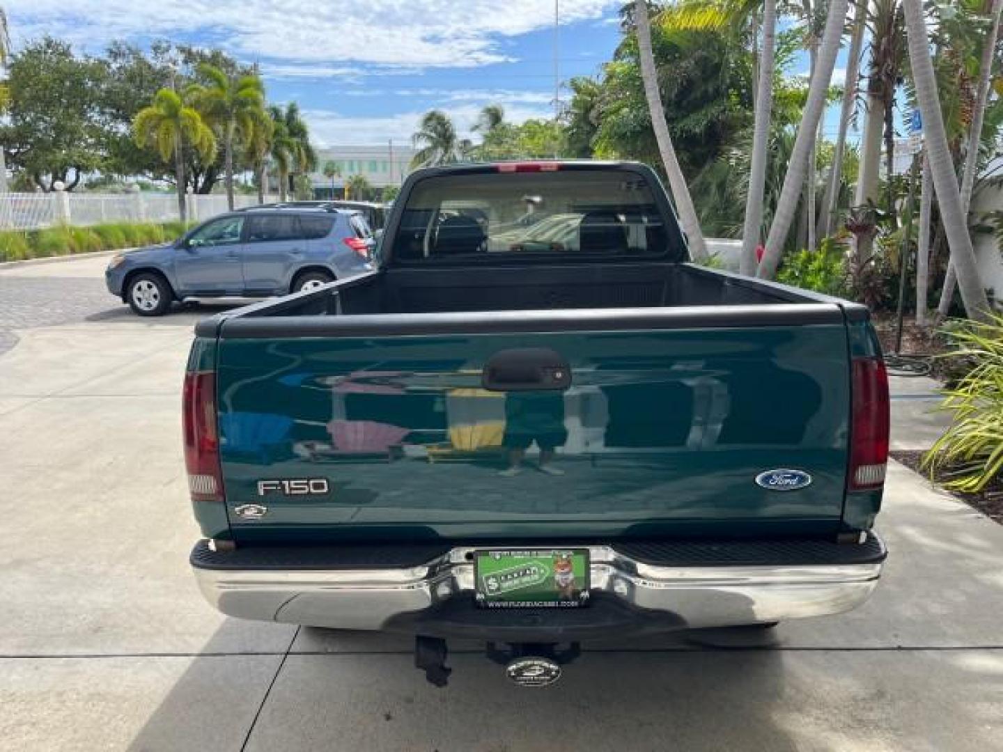 1997 Pacific Green (CC/Met) /Medium Prarie Tan Ford F-150 4WD Lariat LOW MILES 89,299 (1FTDX1860VK) with an 4.6L EFI OHC V8 Triton Engine engine, Automatic transmission, located at 4701 North Dixie Hwy, Pompano Beach, FL, 33064, (954) 422-2889, 26.240938, -80.123474 - OUR WEBPAGE FLORIDACARS1.COM HAS OVER 100 PHOTOS AND FREE CARFAX LINK 1997 FORD F-150 ROAD READY WORK READY VIN: 1FTDX1860VKA73358 NO ACCIDENTS 4X4 3 DOOR EXTENDED CAB PICKUP NO RECALLS 4.6L V8 4.6L V8 F 4X4 FLORIDA OWNER GASOLINE 20 SERVICE RECORDS POWER LEATHER SEATS REAR WHEEL DRIVE W/ 4X4 8 FT B - Photo#89