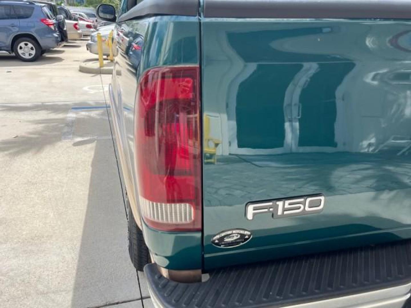 1997 Pacific Green (CC/Met) /Medium Prarie Tan Ford F-150 4WD Lariat LOW MILES 89,299 (1FTDX1860VK) with an 4.6L EFI OHC V8 Triton Engine engine, Automatic transmission, located at 4701 North Dixie Hwy, Pompano Beach, FL, 33064, (954) 422-2889, 26.240938, -80.123474 - OUR WEBPAGE FLORIDACARS1.COM HAS OVER 100 PHOTOS AND FREE CARFAX LINK 1997 FORD F-150 ROAD READY WORK READY VIN: 1FTDX1860VKA73358 NO ACCIDENTS 4X4 3 DOOR EXTENDED CAB PICKUP NO RECALLS 4.6L V8 4.6L V8 F 4X4 FLORIDA OWNER GASOLINE 20 SERVICE RECORDS POWER LEATHER SEATS REAR WHEEL DRIVE W/ 4X4 8 FT B - Photo#93