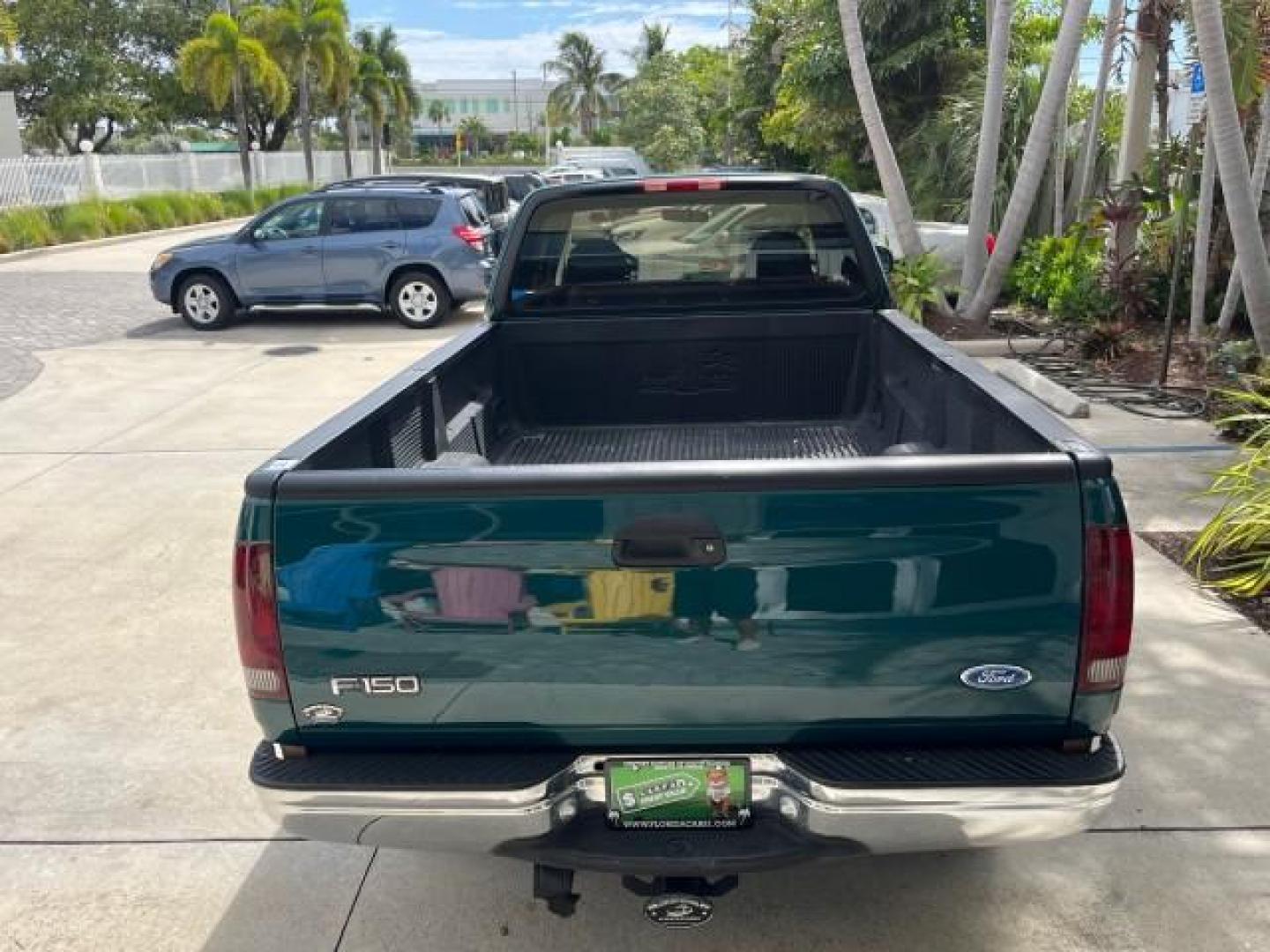 1997 Pacific Green (CC/Met) /Medium Prarie Tan Ford F-150 4WD Lariat LOW MILES 89,299 (1FTDX1860VK) with an 4.6L EFI OHC V8 Triton Engine engine, Automatic transmission, located at 4701 North Dixie Hwy, Pompano Beach, FL, 33064, (954) 422-2889, 26.240938, -80.123474 - OUR WEBPAGE FLORIDACARS1.COM HAS OVER 100 PHOTOS AND FREE CARFAX LINK 1997 FORD F-150 ROAD READY WORK READY VIN: 1FTDX1860VKA73358 NO ACCIDENTS 4X4 3 DOOR EXTENDED CAB PICKUP NO RECALLS 4.6L V8 4.6L V8 F 4X4 FLORIDA OWNER GASOLINE 20 SERVICE RECORDS POWER LEATHER SEATS REAR WHEEL DRIVE W/ 4X4 8 FT B - Photo#98