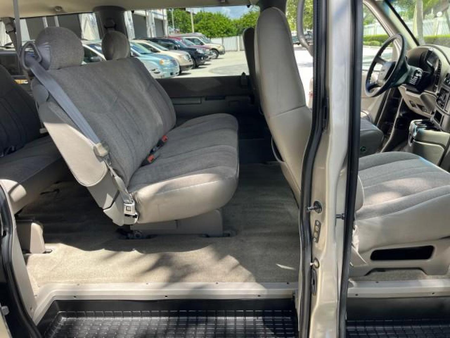 2002 Storm Gray Metallic /Pewter GMC Safari Passenger 7 PASS LOW MILES 58,918 (1GKDM19XX2B) with an 4.3L Vortec 4300 SFI V6 Engine engine, Automatic transmission, located at 4701 North Dixie Hwy, Pompano Beach, FL, 33064, (954) 422-2889, 26.240938, -80.123474 - OUR WEBPAGE FLORIDACARS1.COM HAS OVER 100 PHOTOS AND FREE CARFAX LINK 2002 GMC SAFARI SLE ROAD READY 4.3L V6 VIN: 1GKDM19XX2B506507 NO RECALLS VAN 1 OWNER SLE 4.3L V6 F OHV 12V LOW MILES 58,918 GASOLINE 7 PASSANGER REAR WHEEL DRIVE 15 SERVICE RECORDS Anti-Theft System Approach Lights Black Roof Rack - Photo#12