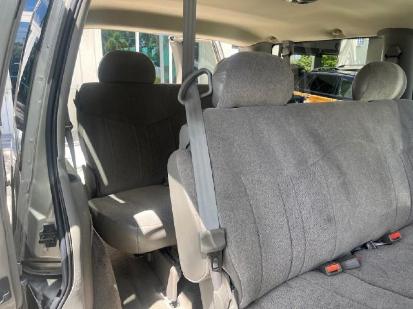 2002 Storm Gray Metallic /Pewter GMC Safari Passenger 7 PASS LOW MILES 58,918 (1GKDM19XX2B) with an 4.3L Vortec 4300 SFI V6 Engine engine, Automatic transmission, located at 4701 North Dixie Hwy, Pompano Beach, FL, 33064, (954) 422-2889, 26.240938, -80.123474 - OUR WEBPAGE FLORIDACARS1.COM HAS OVER 100 PHOTOS AND FREE CARFAX LINK 2002 GMC SAFARI SLE ROAD READY 4.3L V6 VIN: 1GKDM19XX2B506507 NO RECALLS VAN 1 OWNER SLE 4.3L V6 F OHV 12V LOW MILES 58,918 GASOLINE 7 PASSANGER REAR WHEEL DRIVE 15 SERVICE RECORDS Anti-Theft System Approach Lights Black Roof Rack - Photo#28