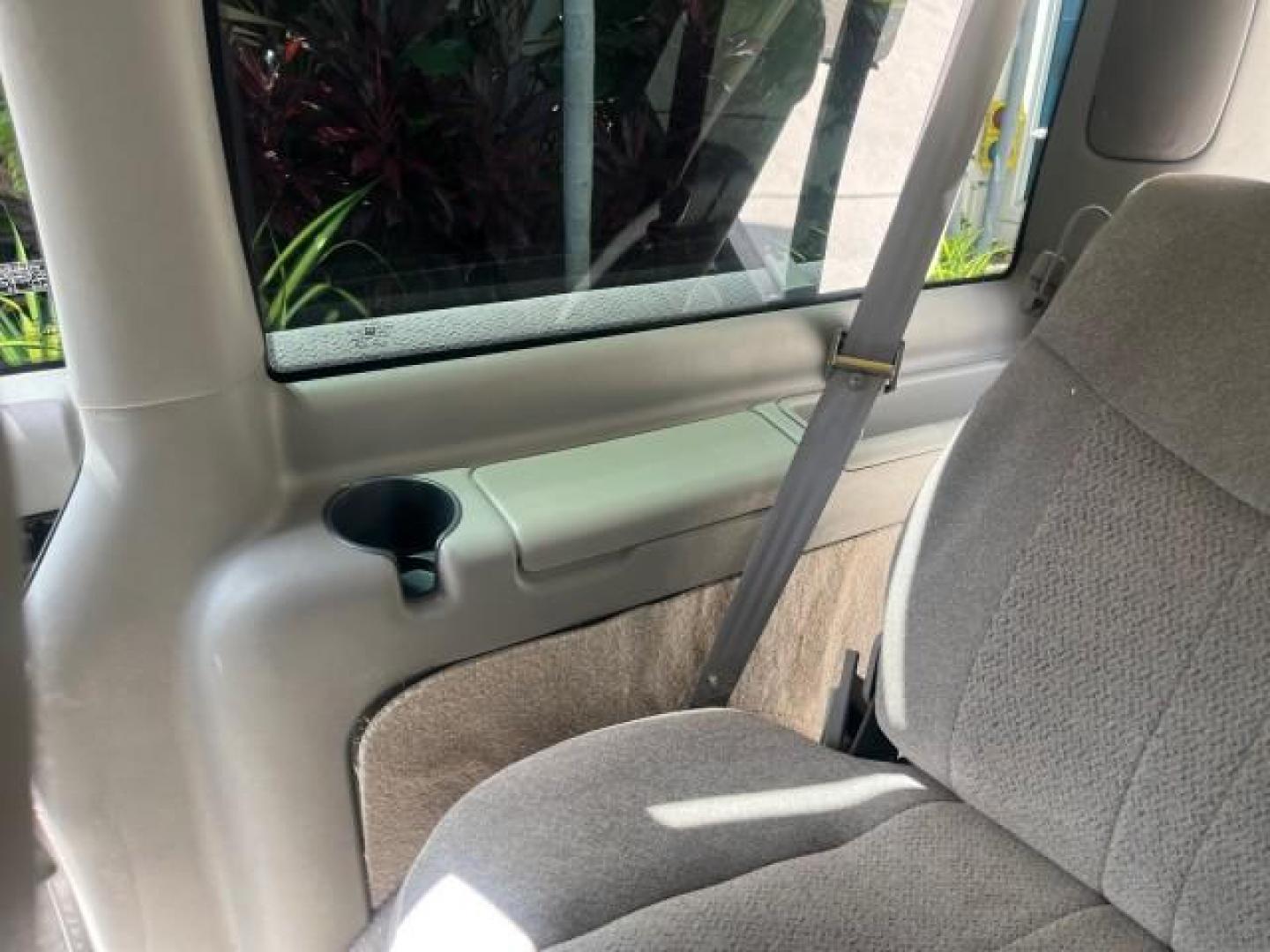 2002 Storm Gray Metallic /Pewter GMC Safari Passenger 7 PASS LOW MILES 58,918 (1GKDM19XX2B) with an 4.3L Vortec 4300 SFI V6 Engine engine, Automatic transmission, located at 4701 North Dixie Hwy, Pompano Beach, FL, 33064, (954) 422-2889, 26.240938, -80.123474 - OUR WEBPAGE FLORIDACARS1.COM HAS OVER 100 PHOTOS AND FREE CARFAX LINK 2002 GMC SAFARI SLE ROAD READY 4.3L V6 VIN: 1GKDM19XX2B506507 NO RECALLS VAN 1 OWNER SLE 4.3L V6 F OHV 12V LOW MILES 58,918 GASOLINE 7 PASSANGER REAR WHEEL DRIVE 15 SERVICE RECORDS Anti-Theft System Approach Lights Black Roof Rack - Photo#34