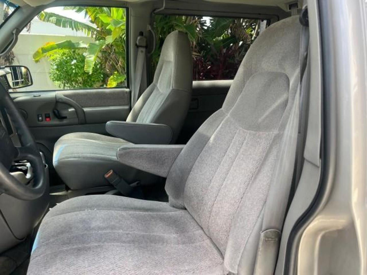 2002 Storm Gray Metallic /Pewter GMC Safari Passenger 7 PASS LOW MILES 58,918 (1GKDM19XX2B) with an 4.3L Vortec 4300 SFI V6 Engine engine, Automatic transmission, located at 4701 North Dixie Hwy, Pompano Beach, FL, 33064, (954) 422-2889, 26.240938, -80.123474 - OUR WEBPAGE FLORIDACARS1.COM HAS OVER 100 PHOTOS AND FREE CARFAX LINK 2002 GMC SAFARI SLE ROAD READY 4.3L V6 VIN: 1GKDM19XX2B506507 NO RECALLS VAN 1 OWNER SLE 4.3L V6 F OHV 12V LOW MILES 58,918 GASOLINE 7 PASSANGER REAR WHEEL DRIVE 15 SERVICE RECORDS Anti-Theft System Approach Lights Black Roof Rack - Photo#63