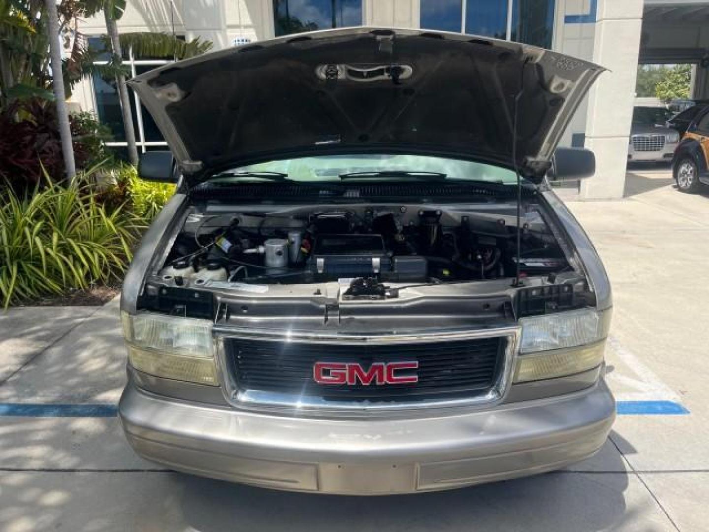 2002 Storm Gray Metallic /Pewter GMC Safari Passenger 7 PASS LOW MILES 58,918 (1GKDM19XX2B) with an 4.3L Vortec 4300 SFI V6 Engine engine, Automatic transmission, located at 4701 North Dixie Hwy, Pompano Beach, FL, 33064, (954) 422-2889, 26.240938, -80.123474 - OUR WEBPAGE FLORIDACARS1.COM HAS OVER 100 PHOTOS AND FREE CARFAX LINK 2002 GMC SAFARI SLE ROAD READY 4.3L V6 VIN: 1GKDM19XX2B506507 NO RECALLS VAN 1 OWNER SLE 4.3L V6 F OHV 12V LOW MILES 58,918 GASOLINE 7 PASSANGER REAR WHEEL DRIVE 15 SERVICE RECORDS Anti-Theft System Approach Lights Black Roof Rack - Photo#65