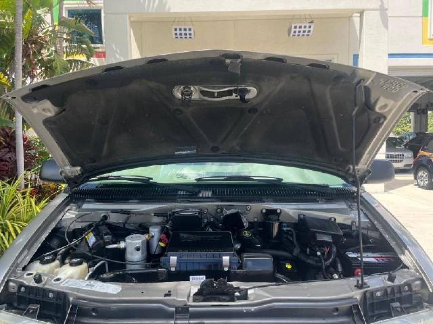 2002 Storm Gray Metallic /Pewter GMC Safari Passenger 7 PASS LOW MILES 58,918 (1GKDM19XX2B) with an 4.3L Vortec 4300 SFI V6 Engine engine, Automatic transmission, located at 4701 North Dixie Hwy, Pompano Beach, FL, 33064, (954) 422-2889, 26.240938, -80.123474 - OUR WEBPAGE FLORIDACARS1.COM HAS OVER 100 PHOTOS AND FREE CARFAX LINK 2002 GMC SAFARI SLE ROAD READY 4.3L V6 VIN: 1GKDM19XX2B506507 NO RECALLS VAN 1 OWNER SLE 4.3L V6 F OHV 12V LOW MILES 58,918 GASOLINE 7 PASSANGER REAR WHEEL DRIVE 15 SERVICE RECORDS Anti-Theft System Approach Lights Black Roof Rack - Photo#69