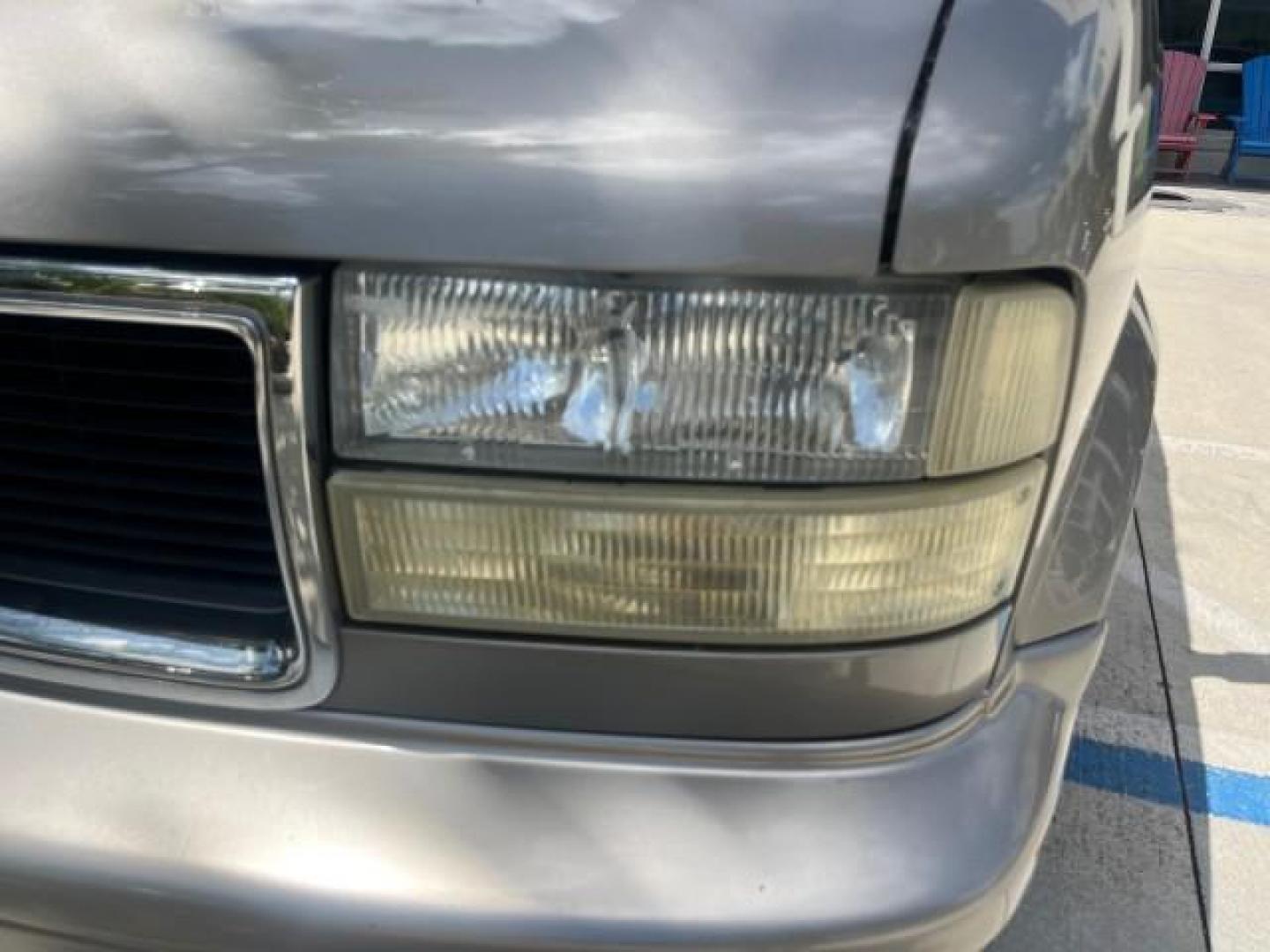 2002 Storm Gray Metallic /Pewter GMC Safari Passenger 7 PASS LOW MILES 58,918 (1GKDM19XX2B) with an 4.3L Vortec 4300 SFI V6 Engine engine, Automatic transmission, located at 4701 North Dixie Hwy, Pompano Beach, FL, 33064, (954) 422-2889, 26.240938, -80.123474 - OUR WEBPAGE FLORIDACARS1.COM HAS OVER 100 PHOTOS AND FREE CARFAX LINK 2002 GMC SAFARI SLE ROAD READY 4.3L V6 VIN: 1GKDM19XX2B506507 NO RECALLS VAN 1 OWNER SLE 4.3L V6 F OHV 12V LOW MILES 58,918 GASOLINE 7 PASSANGER REAR WHEEL DRIVE 15 SERVICE RECORDS Anti-Theft System Approach Lights Black Roof Rack - Photo#73