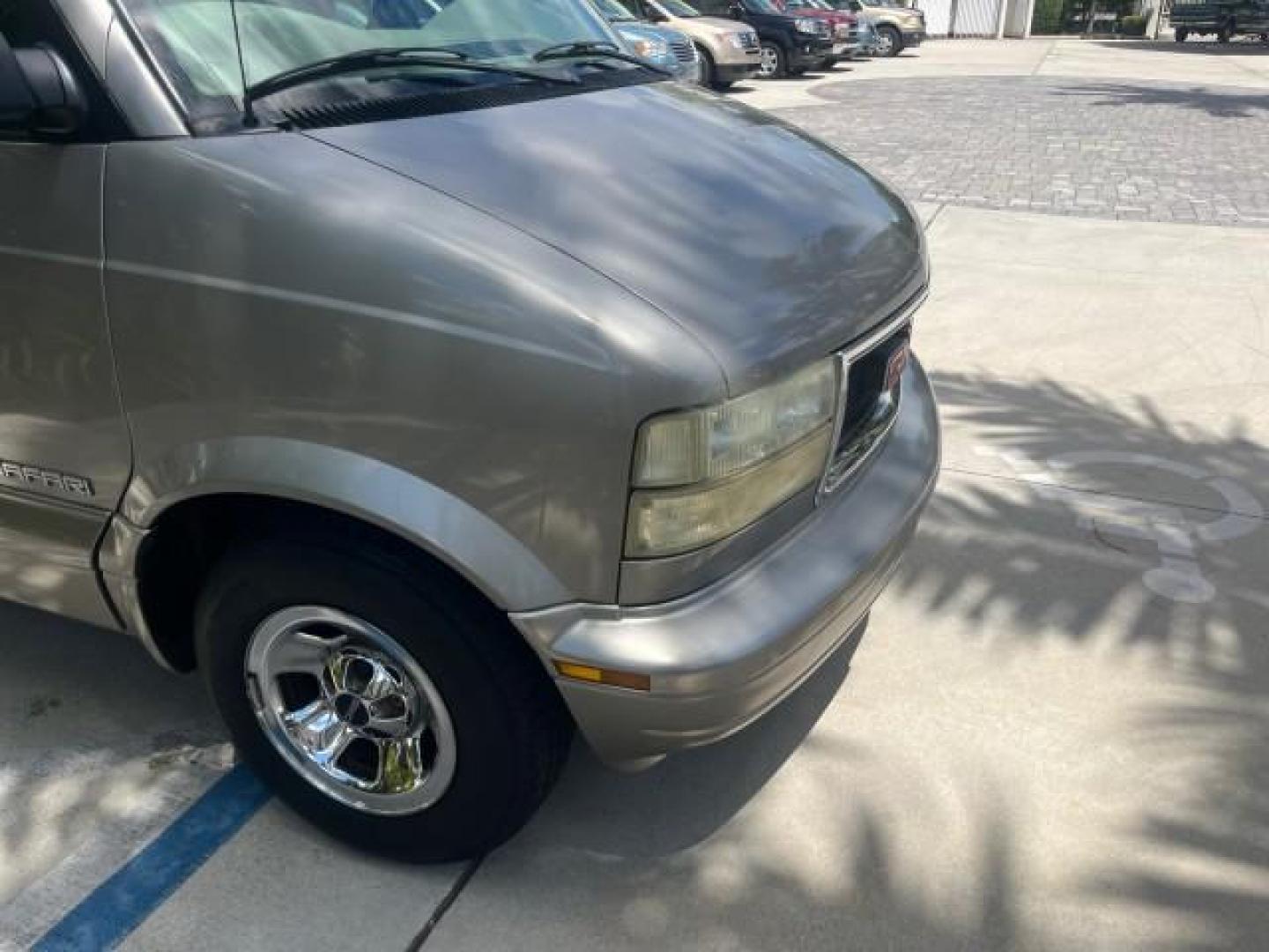 2002 Storm Gray Metallic /Pewter GMC Safari Passenger 7 PASS LOW MILES 58,918 (1GKDM19XX2B) with an 4.3L Vortec 4300 SFI V6 Engine engine, Automatic transmission, located at 4701 North Dixie Hwy, Pompano Beach, FL, 33064, (954) 422-2889, 26.240938, -80.123474 - OUR WEBPAGE FLORIDACARS1.COM HAS OVER 100 PHOTOS AND FREE CARFAX LINK 2002 GMC SAFARI SLE ROAD READY 4.3L V6 VIN: 1GKDM19XX2B506507 NO RECALLS VAN 1 OWNER SLE 4.3L V6 F OHV 12V LOW MILES 58,918 GASOLINE 7 PASSANGER REAR WHEEL DRIVE 15 SERVICE RECORDS Anti-Theft System Approach Lights Black Roof Rack - Photo#79