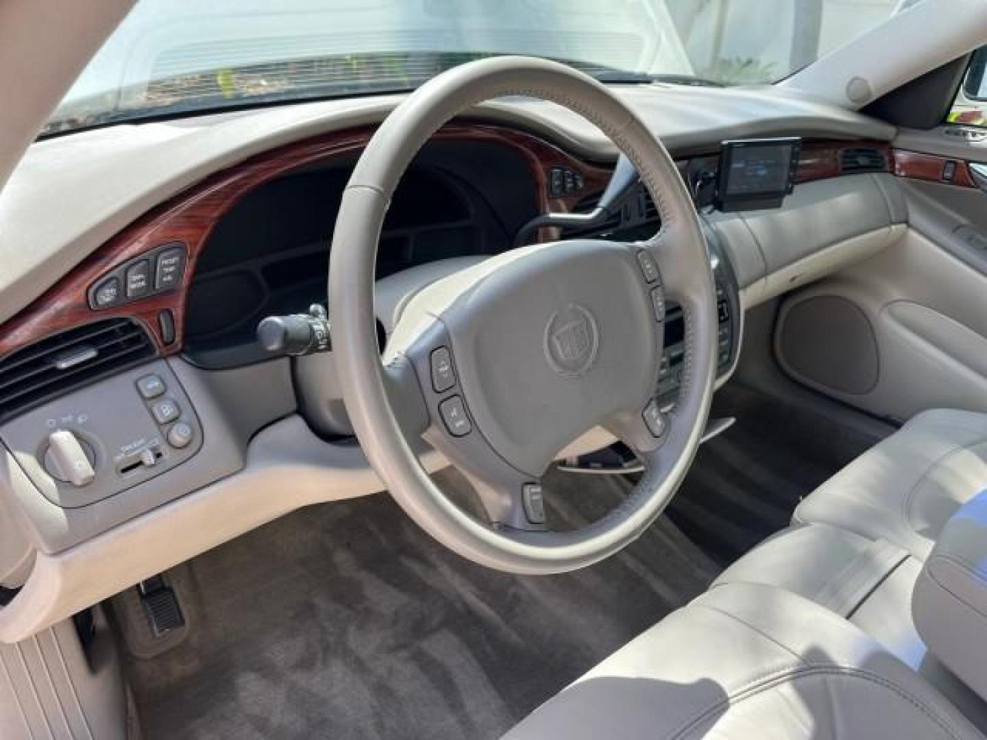 2003 White Diamond /Oatmeal Cadillac DeVille LOW MILES 48,021 (1G6KD54Y63U) with an 4.6L DOHC V8 Northstar Engine engine, Automatic transmission, located at 4701 North Dixie Hwy, Pompano Beach, FL, 33064, (954) 422-2889, 26.240938, -80.123474 - OUR WEBPAGE FLORIDACARS1.COM HAS OVER 100 PHOTOS AND FREE CARFAX LINK 2003 CADILLAC DEVILLE ROAD READY 4.6L V8 VIN: 1G6KD54Y63U260929 NO ACCIDENTS SEDAN 4 DR NO RECALLS DUAL AC 4.6L V8 F DOHC 32V 1 OWNER LEATHER GASOLINE LOW MILES 48,021 FRONT WHEEL DRIVE NEW $ 47,185 11 SERVICE RECORDS Air Suspensi - Photo#38