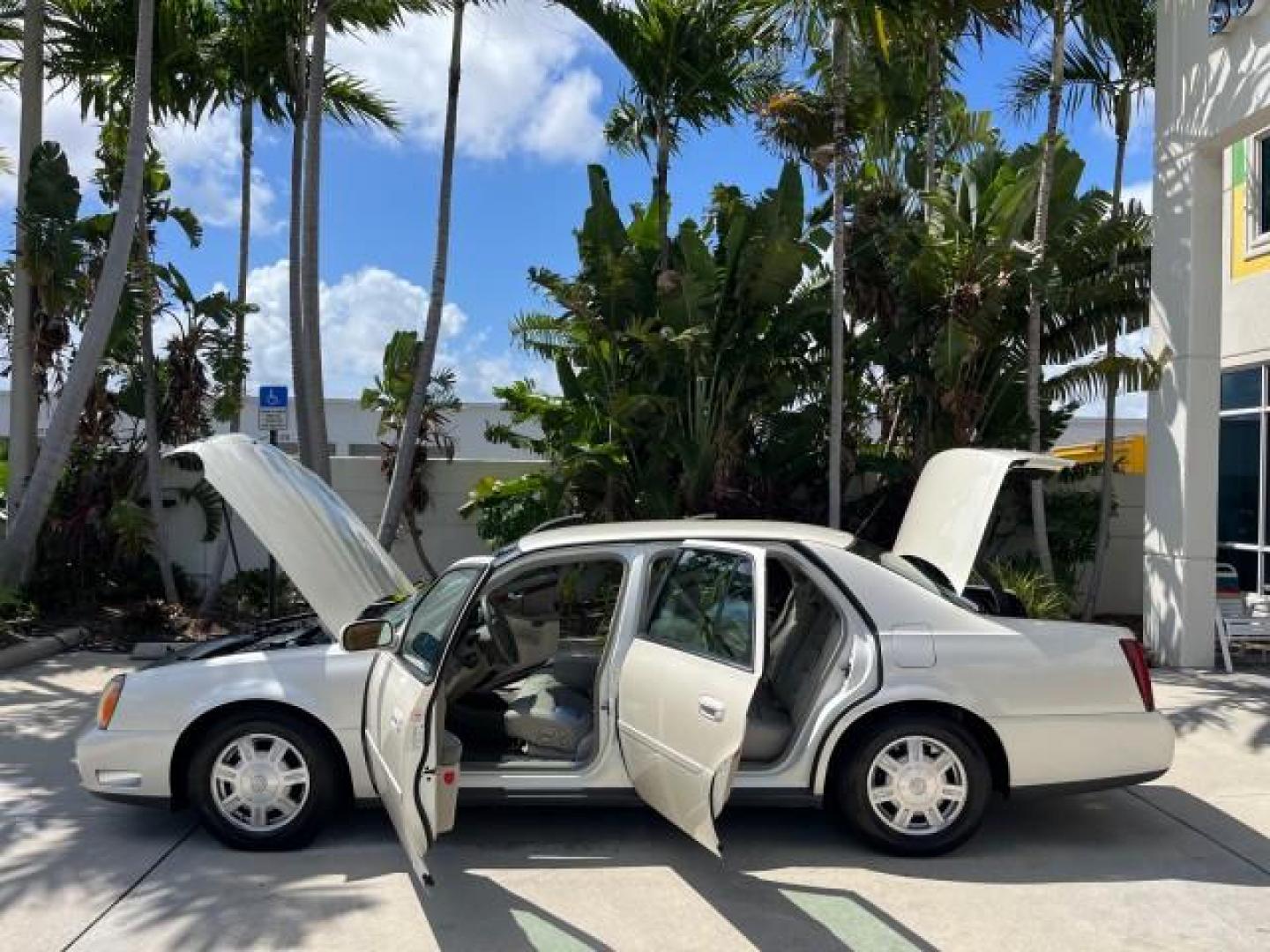 2003 White Diamond /Oatmeal Cadillac DeVille LOW MILES 48,021 (1G6KD54Y63U) with an 4.6L DOHC V8 Northstar Engine engine, Automatic transmission, located at 4701 North Dixie Hwy, Pompano Beach, FL, 33064, (954) 422-2889, 26.240938, -80.123474 - OUR WEBPAGE FLORIDACARS1.COM HAS OVER 100 PHOTOS AND FREE CARFAX LINK 2003 CADILLAC DEVILLE ROAD READY 4.6L V8 VIN: 1G6KD54Y63U260929 NO ACCIDENTS SEDAN 4 DR NO RECALLS DUAL AC 4.6L V8 F DOHC 32V 1 OWNER LEATHER GASOLINE LOW MILES 48,021 FRONT WHEEL DRIVE NEW $ 47,185 11 SERVICE RECORDS Air Suspensi - Photo#8