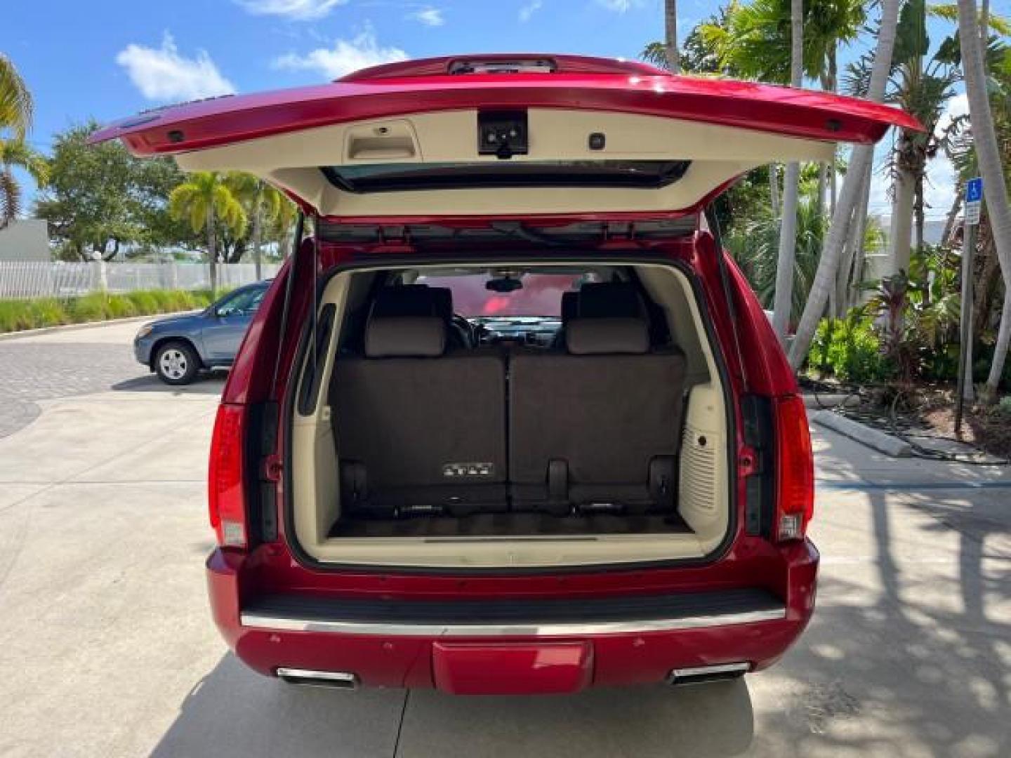 2013 Crystal Red Tintcoat /Cocoa/Light Linen Cadillac Escalade 1 OWNER Platinum Edition LOW MILES 20,007 (1GYS3DEF7DR) with an 6.2L Vortec 1000 V8 SFI E85 Engine engine, Automatic transmission, located at 4701 North Dixie Hwy, Pompano Beach, FL, 33064, (954) 422-2889, 26.240938, -80.123474 - OUR WEBPAGE FLORIDACARS1.COM HAS OVER 100 PHOTOS AND FREE CARFAX LINK NEW $ 80,185 2013 CADILLAC ESCALADE PLATINUM EDITION ROAD READY 6.2L V8 VIN: 1GYS3DEF7DR143317 NO ACCIDENTS NO RECALLS 4 DOOR WAGON/SPORT UTILITY 1 OWNER NAVIGATION 6.2L V8 F OHV 16V POWER LIFTGATE 3 ROW LEATHER SEATS FLEX FUEL PO - Photo#84