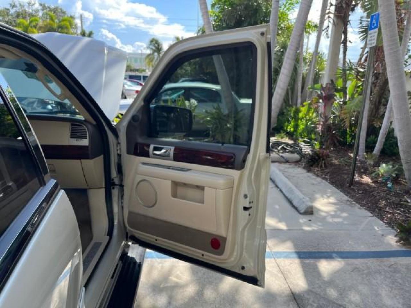 2004 Light French Silk Metallic /Light Parchment Lincoln Navigator `1 OWNER Ultimate LOW MILES 34,094 (5LMFU27R34L) with an 5.4L DOHC 32-Valve V8 Intech Engine engine, Automatic transmission, located at 4701 North Dixie Hwy, Pompano Beach, FL, 33064, (954) 422-2889, 26.240938, -80.123474 - OUR WEBPAGE FLORIDACARS1.COM HAS OVER 100 PHOTOS AND FREE CARFAX LINK 2004 LINCOLN NAVIGATOR LUXURY NEW $52,125 ROAD READY VIN: 5LMFU27R34LJ40460 NO ACCIDENTS NO RECALLS 4 DOOR WAGON/SPORT UTILITY 1 OWNER LOW MILES 34,094 5.4L V8 F DOHC 3 ROW LEATHER SEATS DVD GASOLINE PARK SENSORS SUNROOF REAR WHEE - Photo#11