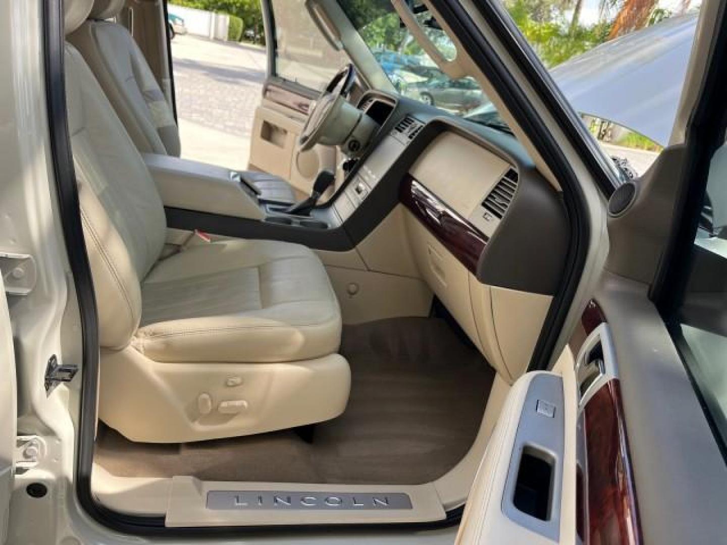 2004 Light French Silk Metallic /Light Parchment Lincoln Navigator `1 OWNER Ultimate LOW MILES 34,094 (5LMFU27R34L) with an 5.4L DOHC 32-Valve V8 Intech Engine engine, Automatic transmission, located at 4701 North Dixie Hwy, Pompano Beach, FL, 33064, (954) 422-2889, 26.240938, -80.123474 - OUR WEBPAGE FLORIDACARS1.COM HAS OVER 100 PHOTOS AND FREE CARFAX LINK 2004 LINCOLN NAVIGATOR LUXURY NEW $52,125 ROAD READY VIN: 5LMFU27R34LJ40460 NO ACCIDENTS NO RECALLS 4 DOOR WAGON/SPORT UTILITY 1 OWNER LOW MILES 34,094 5.4L V8 F DOHC 3 ROW LEATHER SEATS DVD GASOLINE PARK SENSORS SUNROOF REAR WHEE - Photo#12