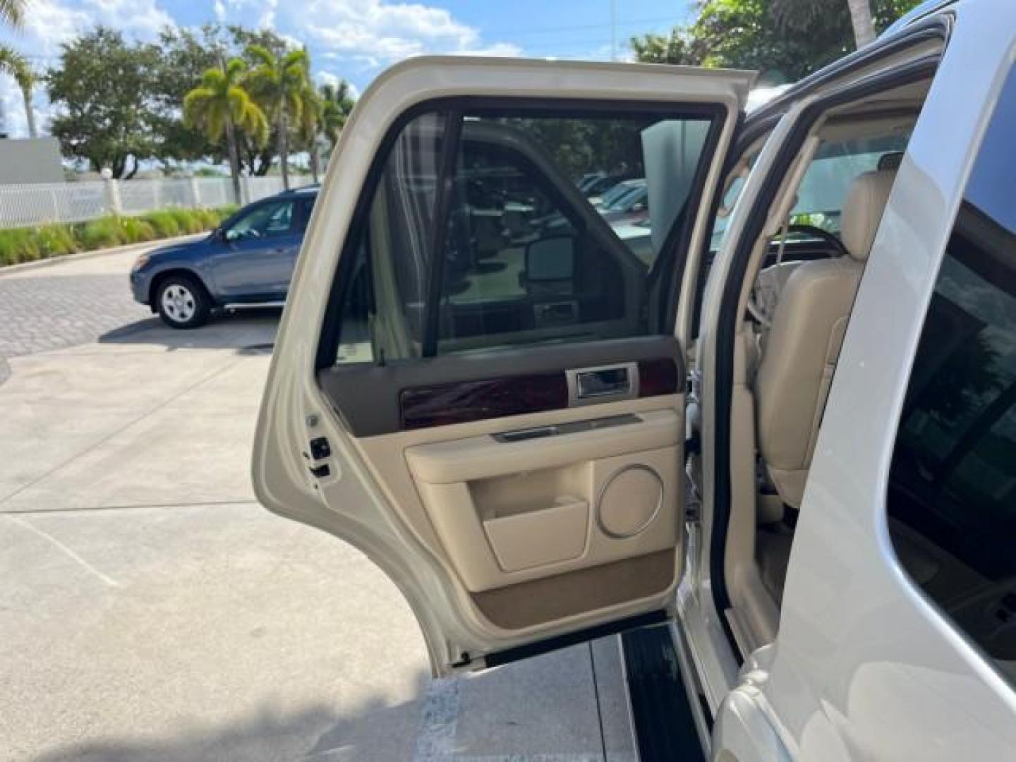 2004 Light French Silk Metallic /Light Parchment Lincoln Navigator `1 OWNER Ultimate LOW MILES 34,094 (5LMFU27R34L) with an 5.4L DOHC 32-Valve V8 Intech Engine engine, Automatic transmission, located at 4701 North Dixie Hwy, Pompano Beach, FL, 33064, (954) 422-2889, 26.240938, -80.123474 - OUR WEBPAGE FLORIDACARS1.COM HAS OVER 100 PHOTOS AND FREE CARFAX LINK 2004 LINCOLN NAVIGATOR LUXURY NEW $52,125 ROAD READY VIN: 5LMFU27R34LJ40460 NO ACCIDENTS NO RECALLS 4 DOOR WAGON/SPORT UTILITY 1 OWNER LOW MILES 34,094 5.4L V8 F DOHC 3 ROW LEATHER SEATS DVD GASOLINE PARK SENSORS SUNROOF REAR WHEE - Photo#13