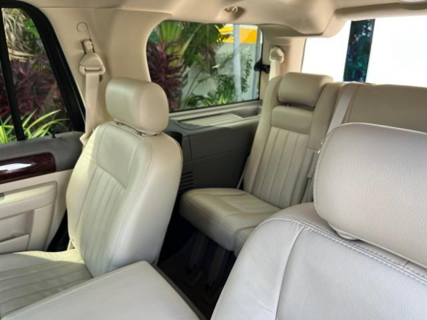 2004 Light French Silk Metallic /Light Parchment Lincoln Navigator `1 OWNER Ultimate LOW MILES 34,094 (5LMFU27R34L) with an 5.4L DOHC 32-Valve V8 Intech Engine engine, Automatic transmission, located at 4701 North Dixie Hwy, Pompano Beach, FL, 33064, (954) 422-2889, 26.240938, -80.123474 - OUR WEBPAGE FLORIDACARS1.COM HAS OVER 100 PHOTOS AND FREE CARFAX LINK 2004 LINCOLN NAVIGATOR LUXURY NEW $52,125 ROAD READY VIN: 5LMFU27R34LJ40460 NO ACCIDENTS NO RECALLS 4 DOOR WAGON/SPORT UTILITY 1 OWNER LOW MILES 34,094 5.4L V8 F DOHC 3 ROW LEATHER SEATS DVD GASOLINE PARK SENSORS SUNROOF REAR WHEE - Photo#53