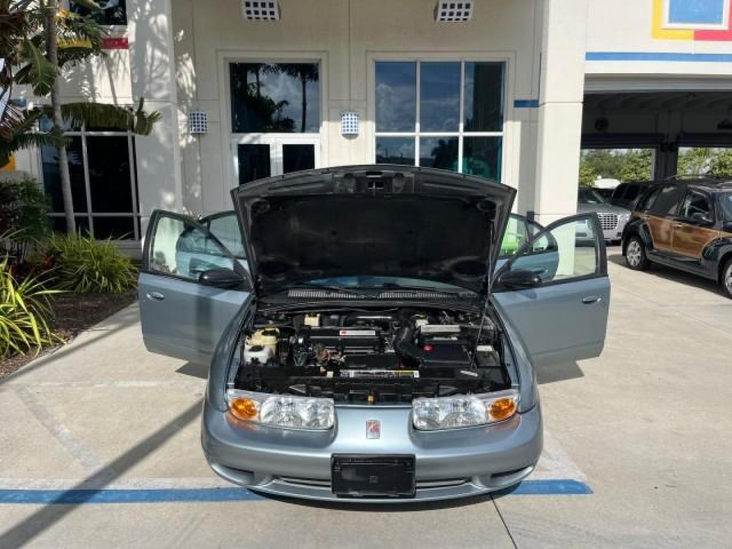 2002 Blue /Grey Saturn SL2 1 OWNER LOW MILES 79,900 (1G8ZK52782Z) with an 1.9L DOHC SPFI 16-Valve L4 Aluminum Engine engine, Automatic transmission, located at 4701 North Dixie Hwy, Pompano Beach, FL, 33064, (954) 422-2889, 26.240938, -80.123474 - OUR WEBPAGE FLORIDACARS1.COM HAS OVER 100 PHOTOS AND FREE CARFAX LINK 2002 SATURN S-SERIES SL2 ROAD READY 1.9L I4 VIN: 1G8ZK52782Z216972 NO ACCIDENTS SEDAN 4 DR NO RECALLS 1.9L I4 F DOHC 16V 1 OWNER 38 MPG GASOLINE LOW MILES 79,900 FRONT WHEEL DRIVE FWD Front Bucket Seats THIS IS ONE OF THE NICEST S - Photo#16