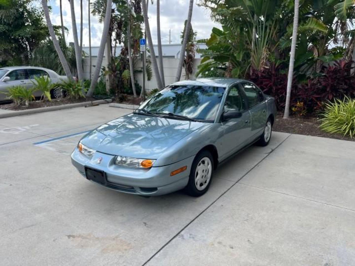 2002 Blue /Grey Saturn SL2 1 OWNER LOW MILES 79,900 (1G8ZK52782Z) with an 1.9L DOHC SPFI 16-Valve L4 Aluminum Engine engine, Automatic transmission, located at 4701 North Dixie Hwy, Pompano Beach, FL, 33064, (954) 422-2889, 26.240938, -80.123474 - OUR WEBPAGE FLORIDACARS1.COM HAS OVER 100 PHOTOS AND FREE CARFAX LINK 2002 SATURN S-SERIES SL2 ROAD READY 1.9L I4 VIN: 1G8ZK52782Z216972 NO ACCIDENTS SEDAN 4 DR NO RECALLS 1.9L I4 F DOHC 16V 1 OWNER 38 MPG GASOLINE LOW MILES 79,900 FRONT WHEEL DRIVE FWD Front Bucket Seats THIS IS ONE OF THE NICEST S - Photo#3