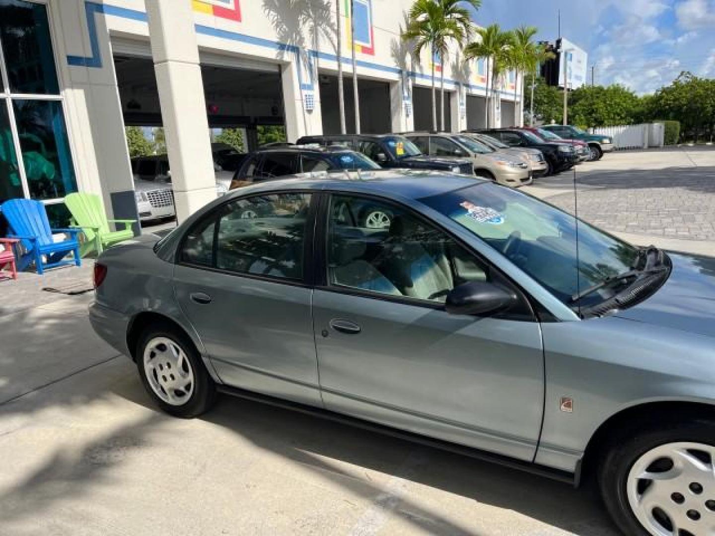 2002 Blue /Grey Saturn SL2 1 OWNER LOW MILES 79,900 (1G8ZK52782Z) with an 1.9L DOHC SPFI 16-Valve L4 Aluminum Engine engine, Automatic transmission, located at 4701 North Dixie Hwy, Pompano Beach, FL, 33064, (954) 422-2889, 26.240938, -80.123474 - OUR WEBPAGE FLORIDACARS1.COM HAS OVER 100 PHOTOS AND FREE CARFAX LINK 2002 SATURN S-SERIES SL2 ROAD READY 1.9L I4 VIN: 1G8ZK52782Z216972 NO ACCIDENTS SEDAN 4 DR NO RECALLS 1.9L I4 F DOHC 16V 1 OWNER 38 MPG GASOLINE LOW MILES 79,900 FRONT WHEEL DRIVE FWD Front Bucket Seats THIS IS ONE OF THE NICEST S - Photo#74