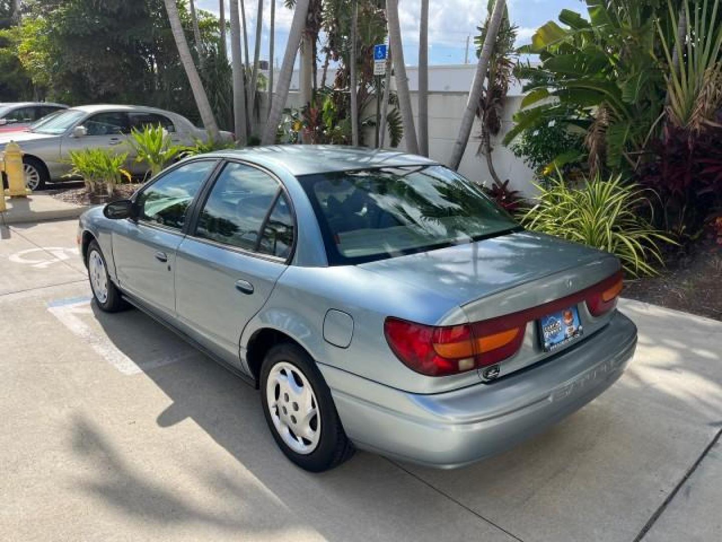 2002 Blue /Grey Saturn SL2 1 OWNER LOW MILES 79,900 (1G8ZK52782Z) with an 1.9L DOHC SPFI 16-Valve L4 Aluminum Engine engine, Automatic transmission, located at 4701 North Dixie Hwy, Pompano Beach, FL, 33064, (954) 422-2889, 26.240938, -80.123474 - OUR WEBPAGE FLORIDACARS1.COM HAS OVER 100 PHOTOS AND FREE CARFAX LINK 2002 SATURN S-SERIES SL2 ROAD READY 1.9L I4 VIN: 1G8ZK52782Z216972 NO ACCIDENTS SEDAN 4 DR NO RECALLS 1.9L I4 F DOHC 16V 1 OWNER 38 MPG GASOLINE LOW MILES 79,900 FRONT WHEEL DRIVE FWD Front Bucket Seats THIS IS ONE OF THE NICEST S - Photo#85