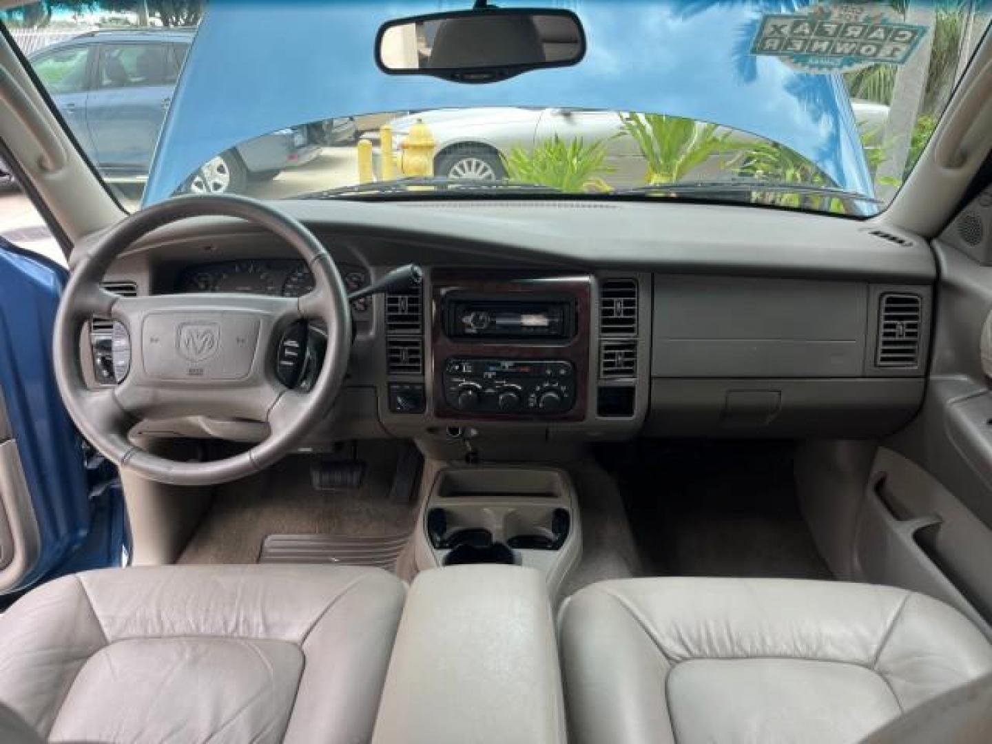 2001 Patriot Blue Pearl /Slate Gray/Taupe Dodge Durango 4WD 1 FL LOW MILES 39,516 (1B4HS28N41F) with an 4.7L SOHC SMPI V8 Magnum Engine engine, Automatic transmission, located at 4701 North Dixie Hwy, Pompano Beach, FL, 33064, (954) 422-2889, 26.240938, -80.123474 - OUR WEBPAGE FLORIDACARS1.COM HAS OVER 100 PHOTOS AND FREE CARFAX LINK 2001 DODGE DURANGO SLT ROAD READY 4.7L V8 VIN: 1B4HS28N41F637509 NO ACCIDENTS 4 DOOR WAGON/SPORT UTILITY 1 OWNER FLORIDA 4.7L V8 F OHV 4X4 ON DEMAND 4WD GASOLINE DUAL AC LOW MILES 39,516 REAR WHEEL DRIVE W/ 4X4 POWER SEATS 3 ROW L - Photo#32