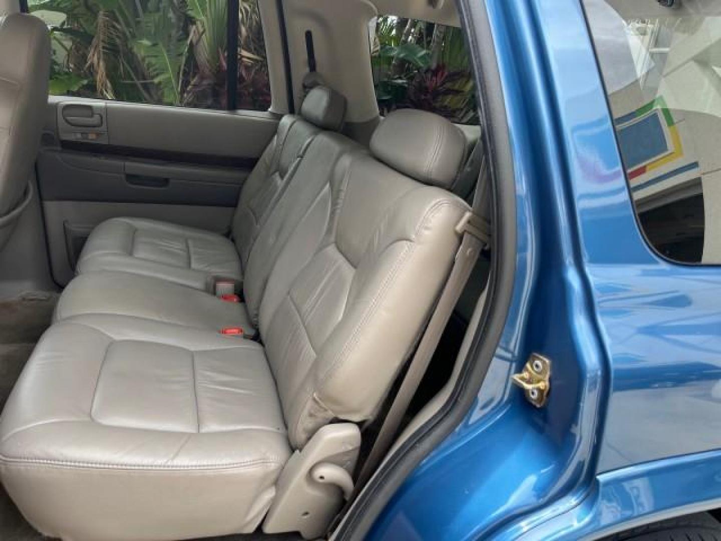 2001 Patriot Blue Pearl /Slate Gray/Taupe Dodge Durango 4WD 1 FL LOW MILES 39,516 (1B4HS28N41F) with an 4.7L SOHC SMPI V8 Magnum Engine engine, Automatic transmission, located at 4701 North Dixie Hwy, Pompano Beach, FL, 33064, (954) 422-2889, 26.240938, -80.123474 - OUR WEBPAGE FLORIDACARS1.COM HAS OVER 100 PHOTOS AND FREE CARFAX LINK 2001 DODGE DURANGO SLT ROAD READY 4.7L V8 VIN: 1B4HS28N41F637509 NO ACCIDENTS 4 DOOR WAGON/SPORT UTILITY 1 OWNER FLORIDA 4.7L V8 F OHV 4X4 ON DEMAND 4WD GASOLINE DUAL AC LOW MILES 39,516 REAR WHEEL DRIVE W/ 4X4 POWER SEATS 3 ROW L - Photo#41