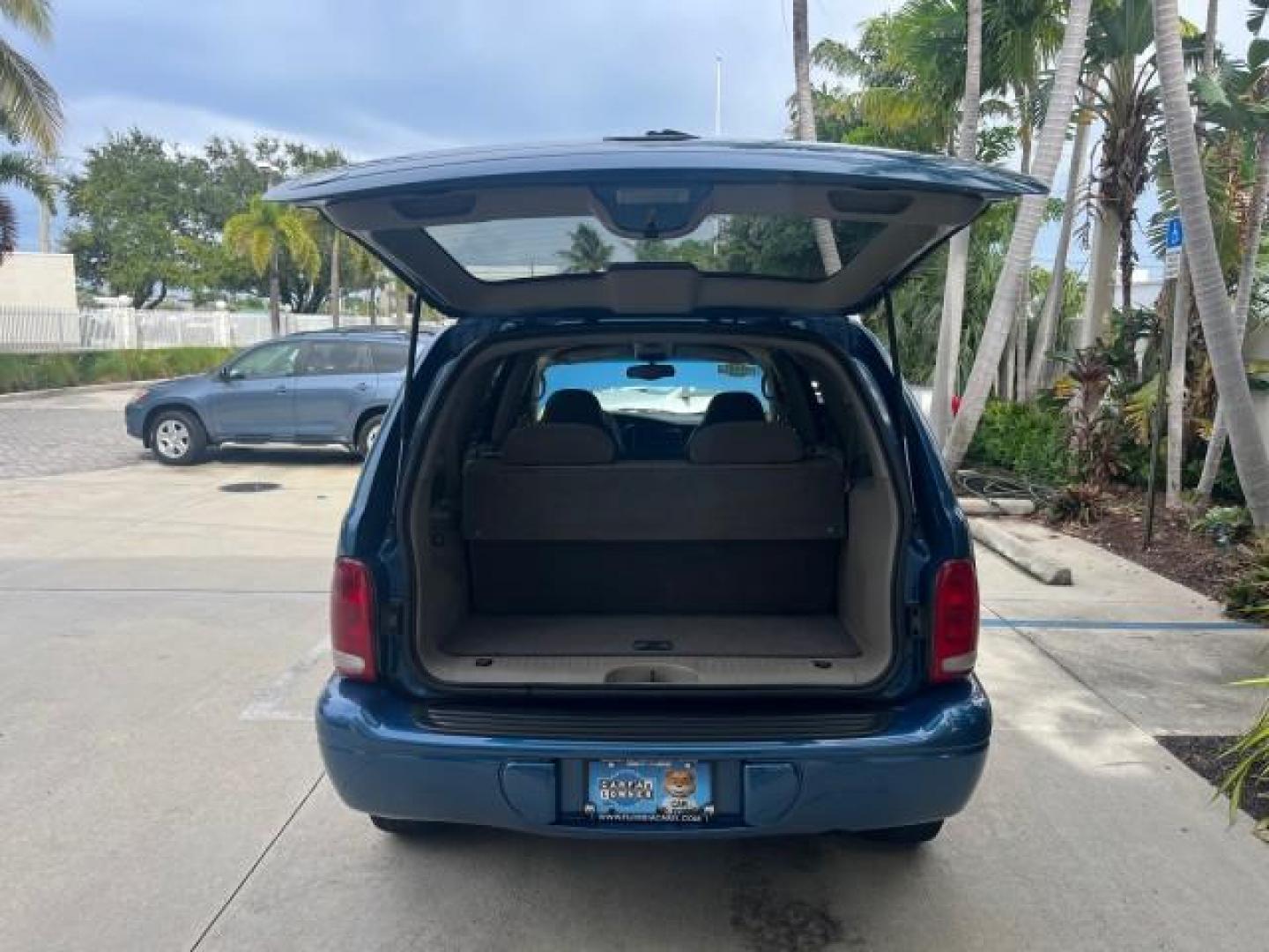 2001 Patriot Blue Pearl /Slate Gray/Taupe Dodge Durango 4WD 1 FL LOW MILES 39,516 (1B4HS28N41F) with an 4.7L SOHC SMPI V8 Magnum Engine engine, Automatic transmission, located at 4701 North Dixie Hwy, Pompano Beach, FL, 33064, (954) 422-2889, 26.240938, -80.123474 - OUR WEBPAGE FLORIDACARS1.COM HAS OVER 100 PHOTOS AND FREE CARFAX LINK 2001 DODGE DURANGO SLT ROAD READY 4.7L V8 VIN: 1B4HS28N41F637509 NO ACCIDENTS 4 DOOR WAGON/SPORT UTILITY 1 OWNER FLORIDA 4.7L V8 F OHV 4X4 ON DEMAND 4WD GASOLINE DUAL AC LOW MILES 39,516 REAR WHEEL DRIVE W/ 4X4 POWER SEATS 3 ROW L - Photo#66