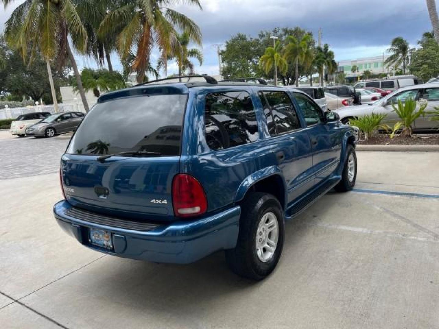 2001 Patriot Blue Pearl /Slate Gray/Taupe Dodge Durango 4WD 1 FL LOW MILES 39,516 (1B4HS28N41F) with an 4.7L SOHC SMPI V8 Magnum Engine engine, Automatic transmission, located at 4701 North Dixie Hwy, Pompano Beach, FL, 33064, (954) 422-2889, 26.240938, -80.123474 - OUR WEBPAGE FLORIDACARS1.COM HAS OVER 100 PHOTOS AND FREE CARFAX LINK 2001 DODGE DURANGO SLT ROAD READY 4.7L V8 VIN: 1B4HS28N41F637509 NO ACCIDENTS 4 DOOR WAGON/SPORT UTILITY 1 OWNER FLORIDA 4.7L V8 F OHV 4X4 ON DEMAND 4WD GASOLINE DUAL AC LOW MILES 39,516 REAR WHEEL DRIVE W/ 4X4 POWER SEATS 3 ROW L - Photo#7