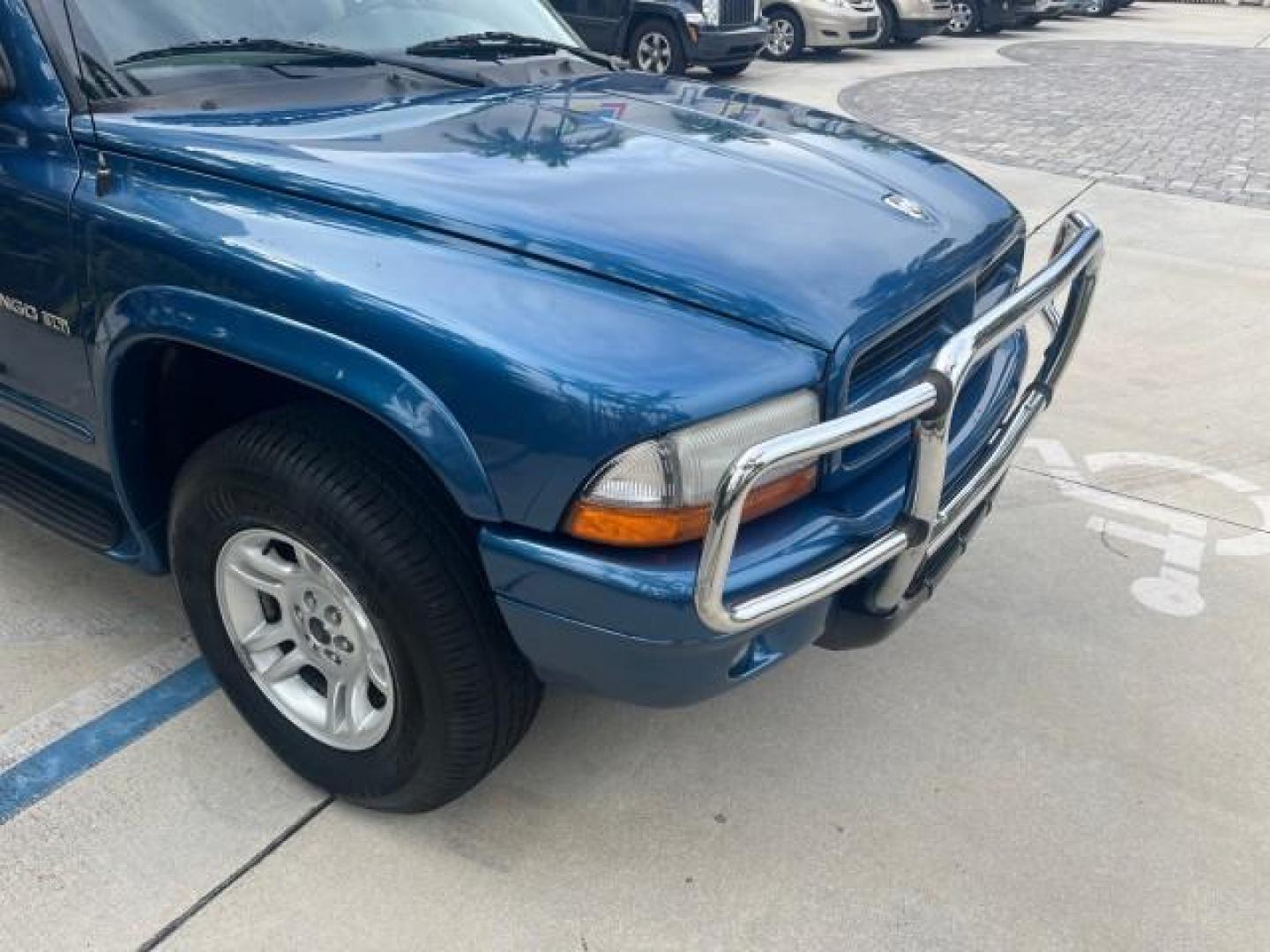 2001 Patriot Blue Pearl /Slate Gray/Taupe Dodge Durango 4WD 1 FL LOW MILES 39,516 (1B4HS28N41F) with an 4.7L SOHC SMPI V8 Magnum Engine engine, Automatic transmission, located at 4701 North Dixie Hwy, Pompano Beach, FL, 33064, (954) 422-2889, 26.240938, -80.123474 - OUR WEBPAGE FLORIDACARS1.COM HAS OVER 100 PHOTOS AND FREE CARFAX LINK 2001 DODGE DURANGO SLT ROAD READY 4.7L V8 VIN: 1B4HS28N41F637509 NO ACCIDENTS 4 DOOR WAGON/SPORT UTILITY 1 OWNER FLORIDA 4.7L V8 F OHV 4X4 ON DEMAND 4WD GASOLINE DUAL AC LOW MILES 39,516 REAR WHEEL DRIVE W/ 4X4 POWER SEATS 3 ROW L - Photo#86