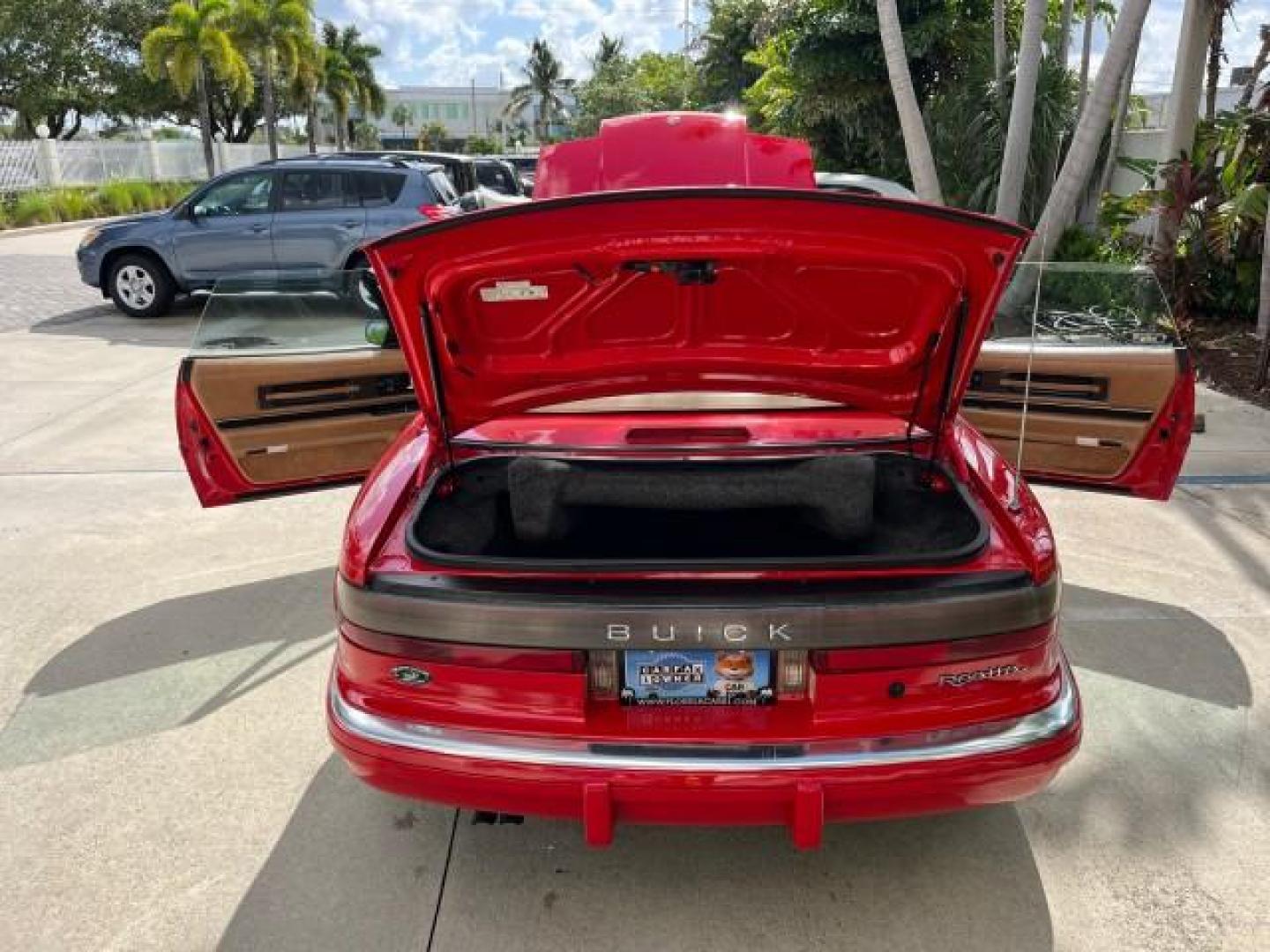 1990 RED /TAN Buick Reatta CONV 1 FL LOW MILES 58,135 (1G4EC33C9LB) with an 3.8L 3800 SFI V6 Engine engine, Automatic transmission, located at 4701 North Dixie Hwy, Pompano Beach, FL, 33064, (954) 422-2889, 26.240938, -80.123474 - OUR WEBPAGE FLORIDACARS1.COM HAS OVER 100 PHOTOS AND FREE CARFAX LINK 1990 BUICK REATTA ROAD READY 3.8L V6 VIN: 1G4EC33C9LB908410 CONVERTIBLE TOP CONVERTIBLE 1 OWNER FLORIDA 3.8L V6 F 12V THE BEST LOW MILES 58,135 GASOLINE POWER LEATHER SEATS FRONT WHEEL DRIVE NO RECALLS THIS IS ONE OF THE NICEST BU - Photo#15