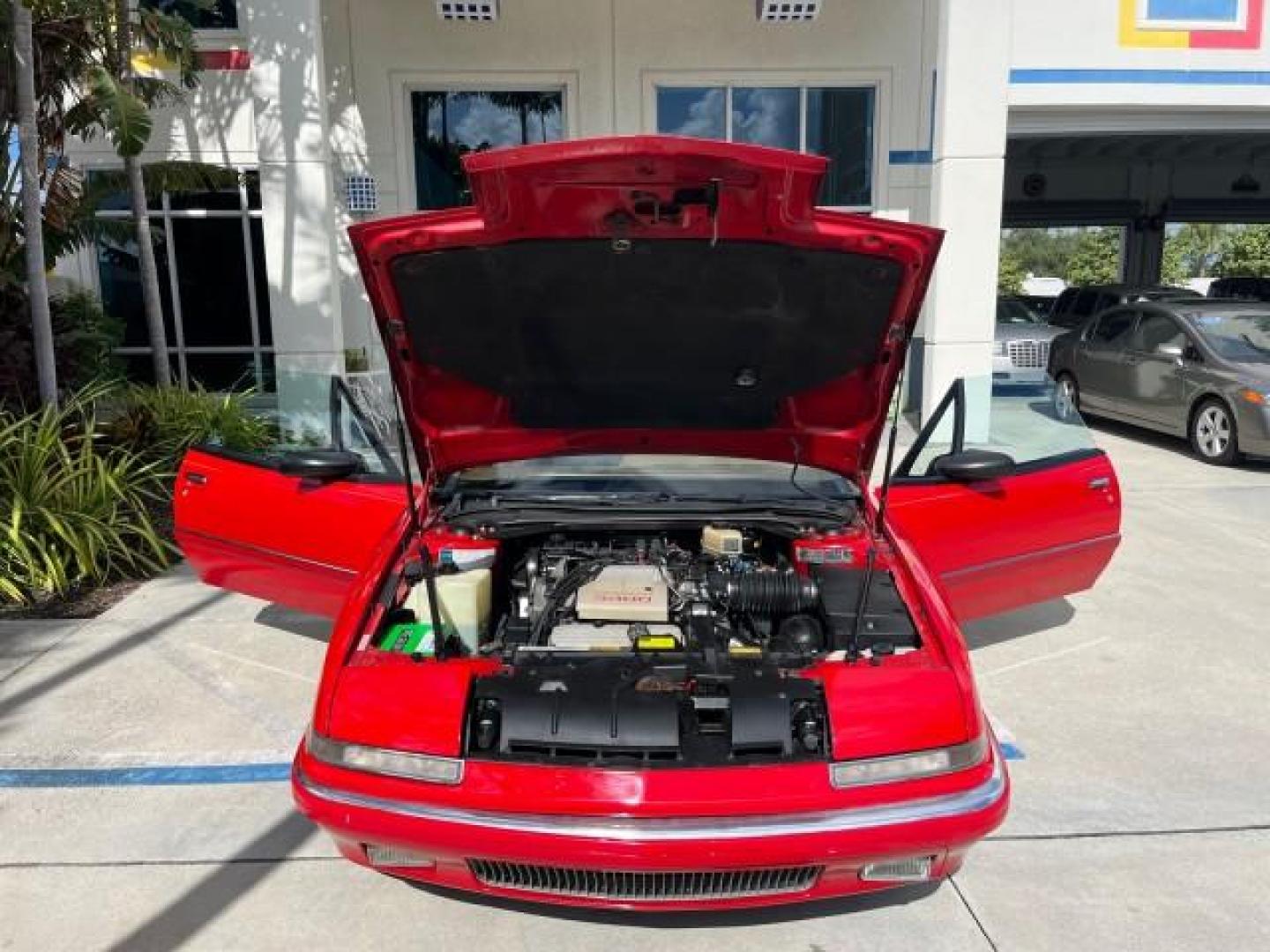 1990 RED /TAN Buick Reatta CONV 1 FL LOW MILES 58,135 (1G4EC33C9LB) with an 3.8L 3800 SFI V6 Engine engine, Automatic transmission, located at 4701 North Dixie Hwy, Pompano Beach, FL, 33064, (954) 422-2889, 26.240938, -80.123474 - OUR WEBPAGE FLORIDACARS1.COM HAS OVER 100 PHOTOS AND FREE CARFAX LINK 1990 BUICK REATTA ROAD READY 3.8L V6 VIN: 1G4EC33C9LB908410 CONVERTIBLE TOP CONVERTIBLE 1 OWNER FLORIDA 3.8L V6 F 12V THE BEST LOW MILES 58,135 GASOLINE POWER LEATHER SEATS FRONT WHEEL DRIVE NO RECALLS THIS IS ONE OF THE NICEST BU - Photo#16