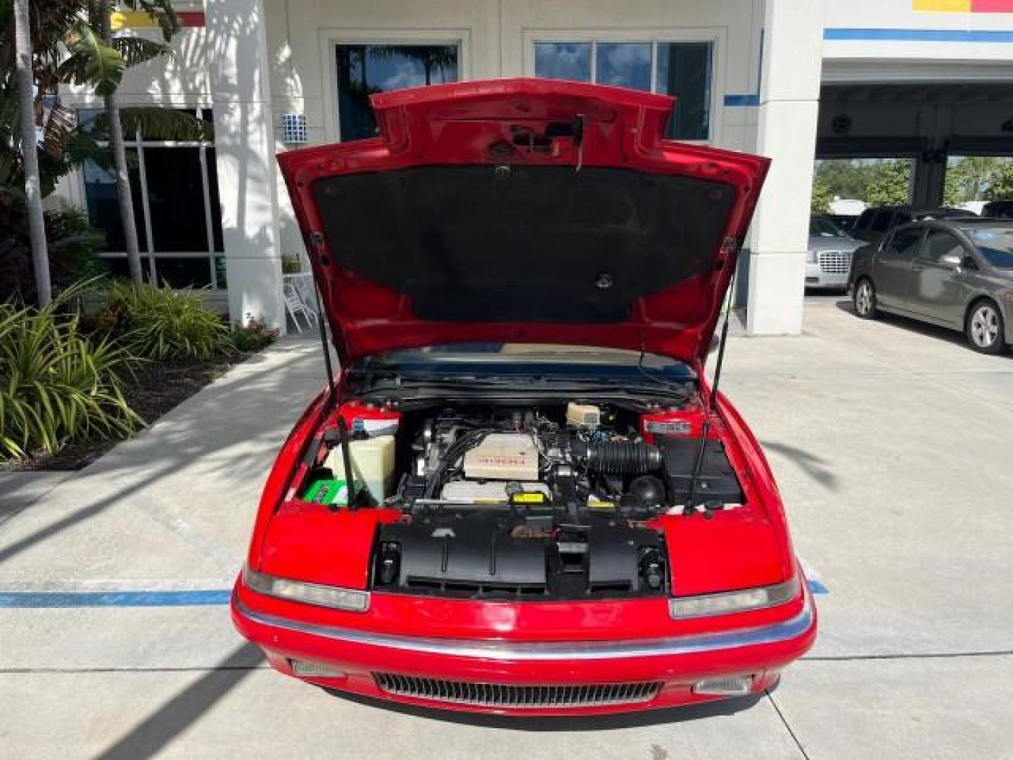 1990 RED /TAN Buick Reatta CONV 1 FL LOW MILES 58,135 (1G4EC33C9LB) with an 3.8L 3800 SFI V6 Engine engine, Automatic transmission, located at 4701 North Dixie Hwy, Pompano Beach, FL, 33064, (954) 422-2889, 26.240938, -80.123474 - OUR WEBPAGE FLORIDACARS1.COM HAS OVER 100 PHOTOS AND FREE CARFAX LINK 1990 BUICK REATTA ROAD READY 3.8L V6 VIN: 1G4EC33C9LB908410 CONVERTIBLE TOP CONVERTIBLE 1 OWNER FLORIDA 3.8L V6 F 12V THE BEST LOW MILES 58,135 GASOLINE POWER LEATHER SEATS FRONT WHEEL DRIVE NO RECALLS THIS IS ONE OF THE NICEST BU - Photo#47