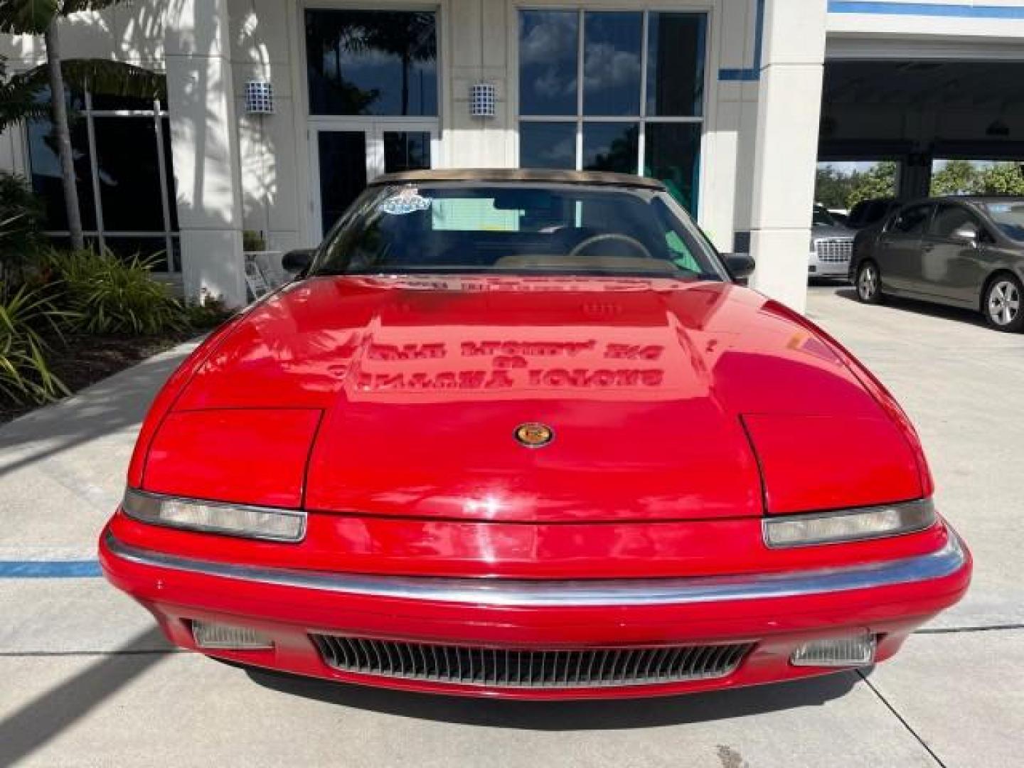 1990 RED /TAN Buick Reatta CONV 1 FL LOW MILES 58,135 (1G4EC33C9LB) with an 3.8L 3800 SFI V6 Engine engine, Automatic transmission, located at 4701 North Dixie Hwy, Pompano Beach, FL, 33064, (954) 422-2889, 26.240938, -80.123474 - OUR WEBPAGE FLORIDACARS1.COM HAS OVER 100 PHOTOS AND FREE CARFAX LINK 1990 BUICK REATTA ROAD READY 3.8L V6 VIN: 1G4EC33C9LB908410 CONVERTIBLE TOP CONVERTIBLE 1 OWNER FLORIDA 3.8L V6 F 12V THE BEST LOW MILES 58,135 GASOLINE POWER LEATHER SEATS FRONT WHEEL DRIVE NO RECALLS THIS IS ONE OF THE NICEST BU - Photo#53