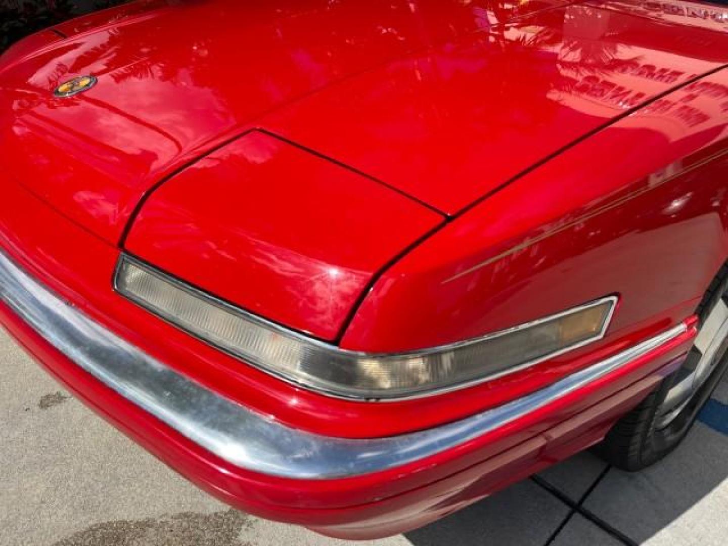 1990 RED /TAN Buick Reatta CONV 1 FL LOW MILES 58,135 (1G4EC33C9LB) with an 3.8L 3800 SFI V6 Engine engine, Automatic transmission, located at 4701 North Dixie Hwy, Pompano Beach, FL, 33064, (954) 422-2889, 26.240938, -80.123474 - OUR WEBPAGE FLORIDACARS1.COM HAS OVER 100 PHOTOS AND FREE CARFAX LINK 1990 BUICK REATTA ROAD READY 3.8L V6 VIN: 1G4EC33C9LB908410 CONVERTIBLE TOP CONVERTIBLE 1 OWNER FLORIDA 3.8L V6 F 12V THE BEST LOW MILES 58,135 GASOLINE POWER LEATHER SEATS FRONT WHEEL DRIVE NO RECALLS THIS IS ONE OF THE NICEST BU - Photo#56