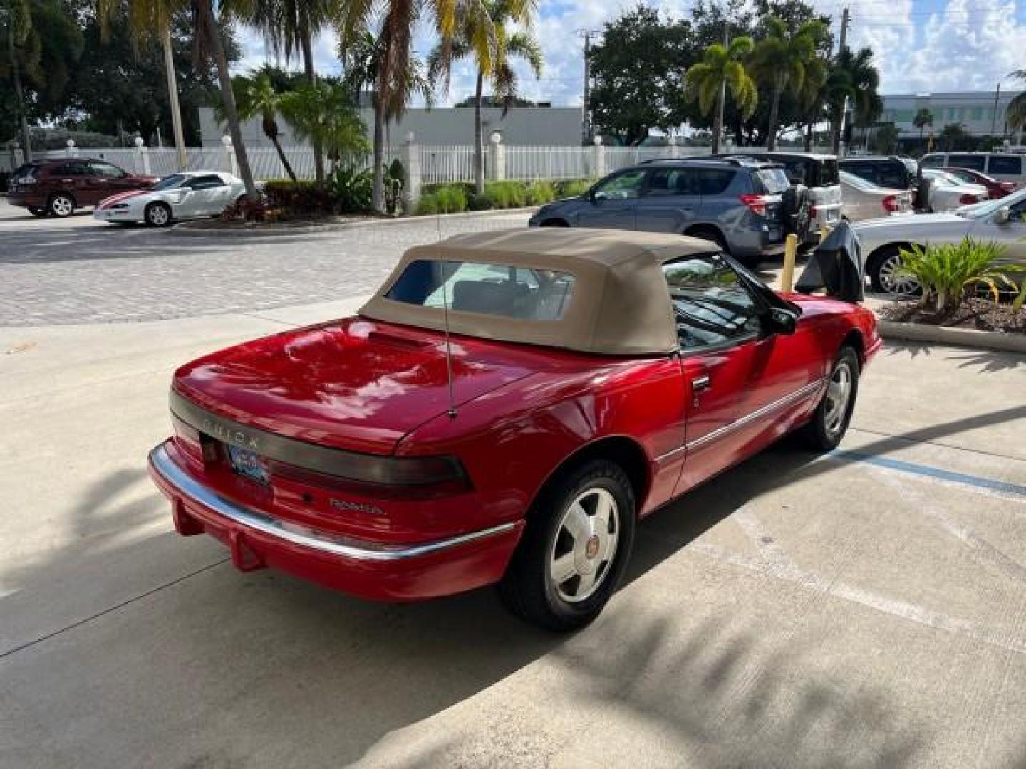 1990 RED /TAN Buick Reatta CONV 1 FL LOW MILES 58,135 (1G4EC33C9LB) with an 3.8L 3800 SFI V6 Engine engine, Automatic transmission, located at 4701 North Dixie Hwy, Pompano Beach, FL, 33064, (954) 422-2889, 26.240938, -80.123474 - OUR WEBPAGE FLORIDACARS1.COM HAS OVER 100 PHOTOS AND FREE CARFAX LINK 1990 BUICK REATTA ROAD READY 3.8L V6 VIN: 1G4EC33C9LB908410 CONVERTIBLE TOP CONVERTIBLE 1 OWNER FLORIDA 3.8L V6 F 12V THE BEST LOW MILES 58,135 GASOLINE POWER LEATHER SEATS FRONT WHEEL DRIVE NO RECALLS THIS IS ONE OF THE NICEST BU - Photo#7