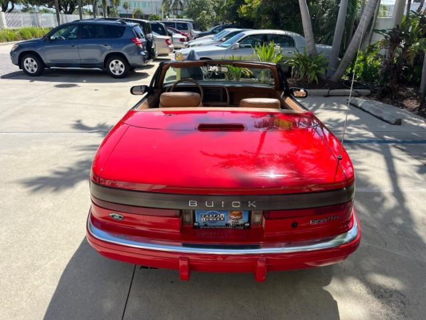 1990 RED /TAN Buick Reatta CONV 1 FL LOW MILES 58,135 (1G4EC33C9LB) with an 3.8L 3800 SFI V6 Engine engine, Automatic transmission, located at 4701 North Dixie Hwy, Pompano Beach, FL, 33064, (954) 422-2889, 26.240938, -80.123474 - OUR WEBPAGE FLORIDACARS1.COM HAS OVER 100 PHOTOS AND FREE CARFAX LINK 1990 BUICK REATTA ROAD READY 3.8L V6 VIN: 1G4EC33C9LB908410 CONVERTIBLE TOP CONVERTIBLE 1 OWNER FLORIDA 3.8L V6 F 12V THE BEST LOW MILES 58,135 GASOLINE POWER LEATHER SEATS FRONT WHEEL DRIVE NO RECALLS THIS IS ONE OF THE NICEST BU - Photo#87