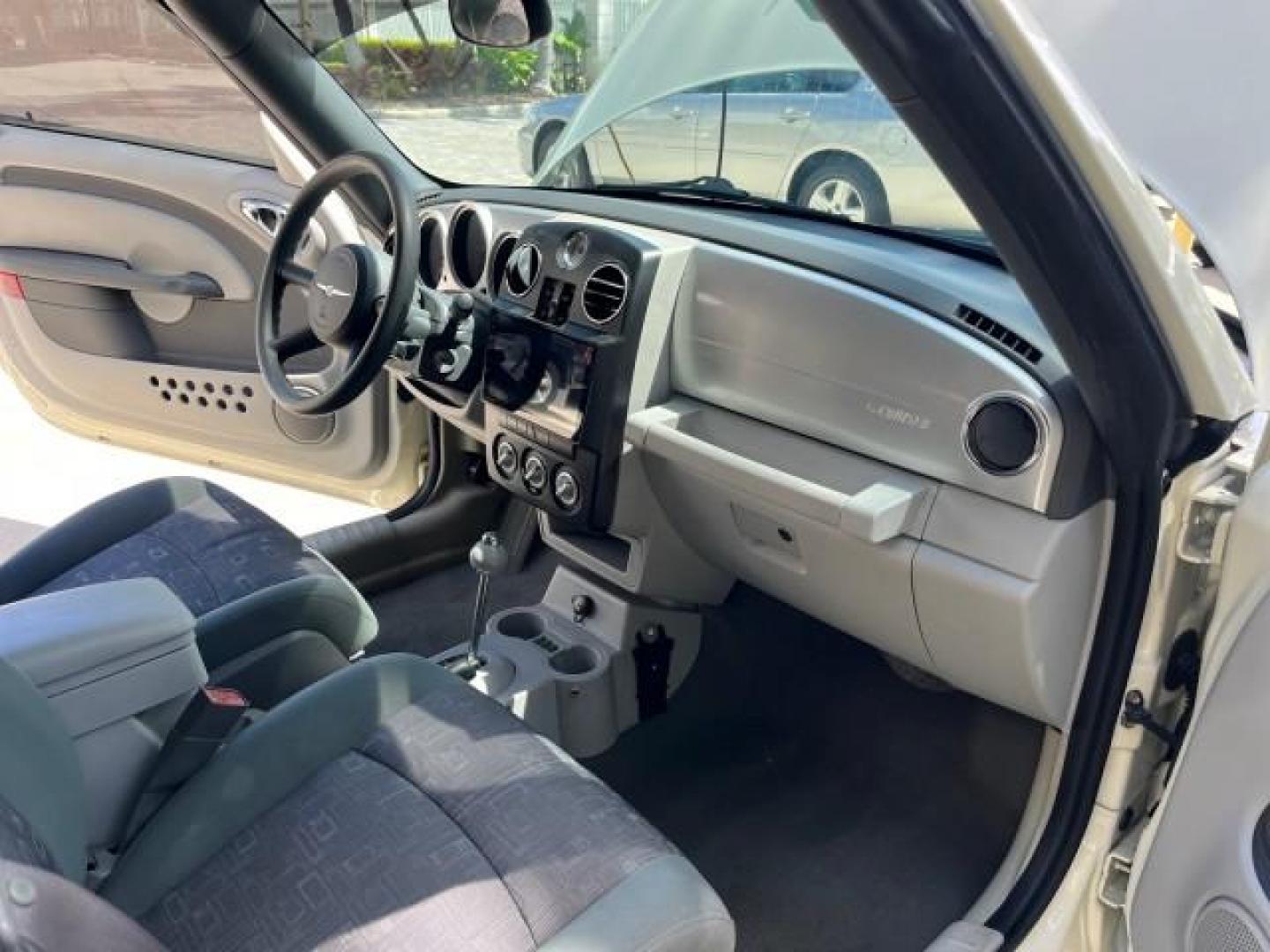 2006 Cool Vanilla /Pastel Slate Gray Chrysler PT Cruiser CONV LOW MILES 82,699 (3C3JY45X66T) with an 2.4L DOHC SMPI 16-Valve I4 Engine engine, Automatic transmission, located at 4701 North Dixie Hwy, Pompano Beach, FL, 33064, (954) 422-2889, 26.240938, -80.123474 - OUR WEBPAGE FLORIDACARS1.COM HAS OVER 100 PHOTOS AND FREE CARFAX LINK 2006 CHRYSLER PT CRUISER ROAD READY 2.4L I4 VIN: 3C3JY45X66T341915 NO RECALLS 29 MPG CONVERTIBLE FLORIDA OWNER 2.4L I4 F DOHC 16V BLUETOOTH LOW MILES 82,699 GASOLINE NAVIGATION POWER CONVERTIBLE TOP FRONT WHEEL DRIVE BACK UP CAMER - Photo#26