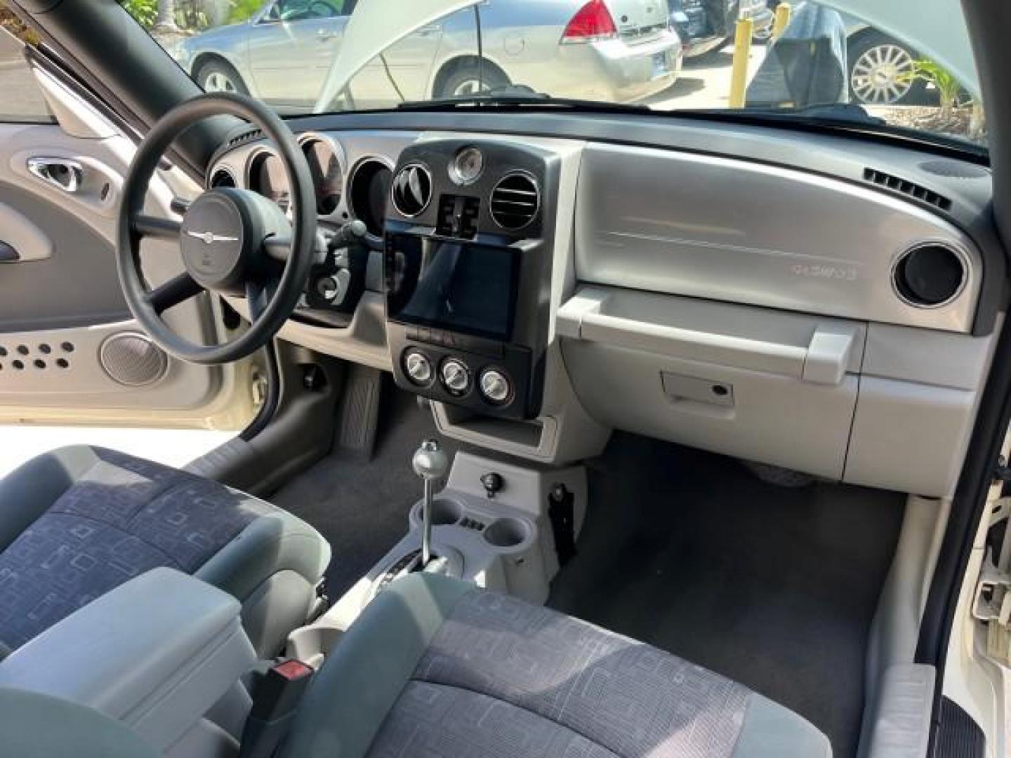 2006 Cool Vanilla /Pastel Slate Gray Chrysler PT Cruiser CONV LOW MILES 82,699 (3C3JY45X66T) with an 2.4L DOHC SMPI 16-Valve I4 Engine engine, Automatic transmission, located at 4701 North Dixie Hwy, Pompano Beach, FL, 33064, (954) 422-2889, 26.240938, -80.123474 - OUR WEBPAGE FLORIDACARS1.COM HAS OVER 100 PHOTOS AND FREE CARFAX LINK 2006 CHRYSLER PT CRUISER ROAD READY 2.4L I4 VIN: 3C3JY45X66T341915 NO RECALLS 29 MPG CONVERTIBLE FLORIDA OWNER 2.4L I4 F DOHC 16V BLUETOOTH LOW MILES 82,699 GASOLINE NAVIGATION POWER CONVERTIBLE TOP FRONT WHEEL DRIVE BACK UP CAMER - Photo#27