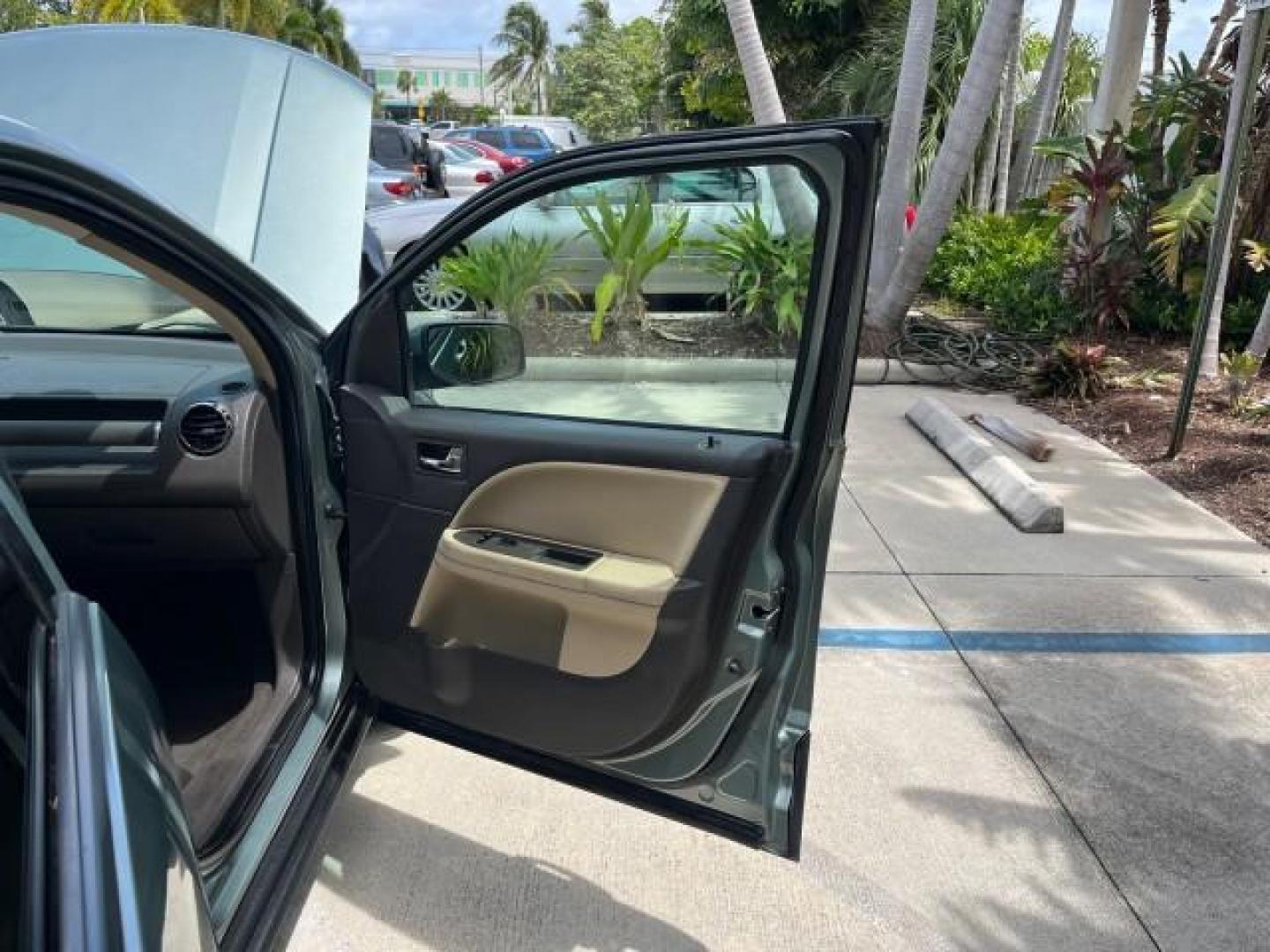 2008 Titanium Green Metallic /Camel Ford Taurus X 1 FL SEL LOW MILES 65,186 3RD ROW (1FMDK02W48G) with an 3.5L SMPI 24-Valve V6 Duratec Engine engine, Automatic transmission, located at 4701 North Dixie Hwy, Pompano Beach, FL, 33064, (954) 422-2889, 26.240938, -80.123474 - OUR WEBPAGE FLORIDACARS1.COM HAS OVER 100 PHOTOS AND FREE CARFAX LINK 2008 FORD TAURUS X SEL ROAD READY 3.5L V6 VIN: 1FMDK02W48GA18867 NO RECALLS 24 MPG 4 DOOR WAGON/SPORT UTILITY 1 OWNER FLORIDA 3.5L V6 F 3 ROW SEATS GASOLINE LOW MILES 65,186 FRONT WHEEL DRIVE POWER SEATS/MIRRORS 9 SERVICE RECORDS - Photo#11