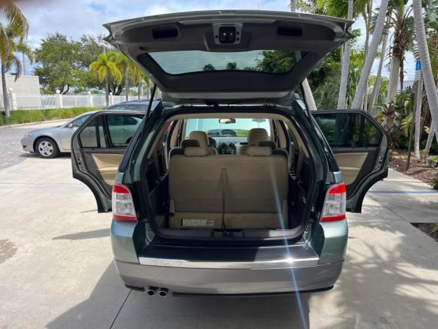 2008 Titanium Green Metallic /Camel Ford Taurus X 1 FL SEL LOW MILES 65,186 3RD ROW (1FMDK02W48G) with an 3.5L SMPI 24-Valve V6 Duratec Engine engine, Automatic transmission, located at 4701 North Dixie Hwy, Pompano Beach, FL, 33064, (954) 422-2889, 26.240938, -80.123474 - OUR WEBPAGE FLORIDACARS1.COM HAS OVER 100 PHOTOS AND FREE CARFAX LINK 2008 FORD TAURUS X SEL ROAD READY 3.5L V6 VIN: 1FMDK02W48GA18867 NO RECALLS 24 MPG 4 DOOR WAGON/SPORT UTILITY 1 OWNER FLORIDA 3.5L V6 F 3 ROW SEATS GASOLINE LOW MILES 65,186 FRONT WHEEL DRIVE POWER SEATS/MIRRORS 9 SERVICE RECORDS - Photo#15